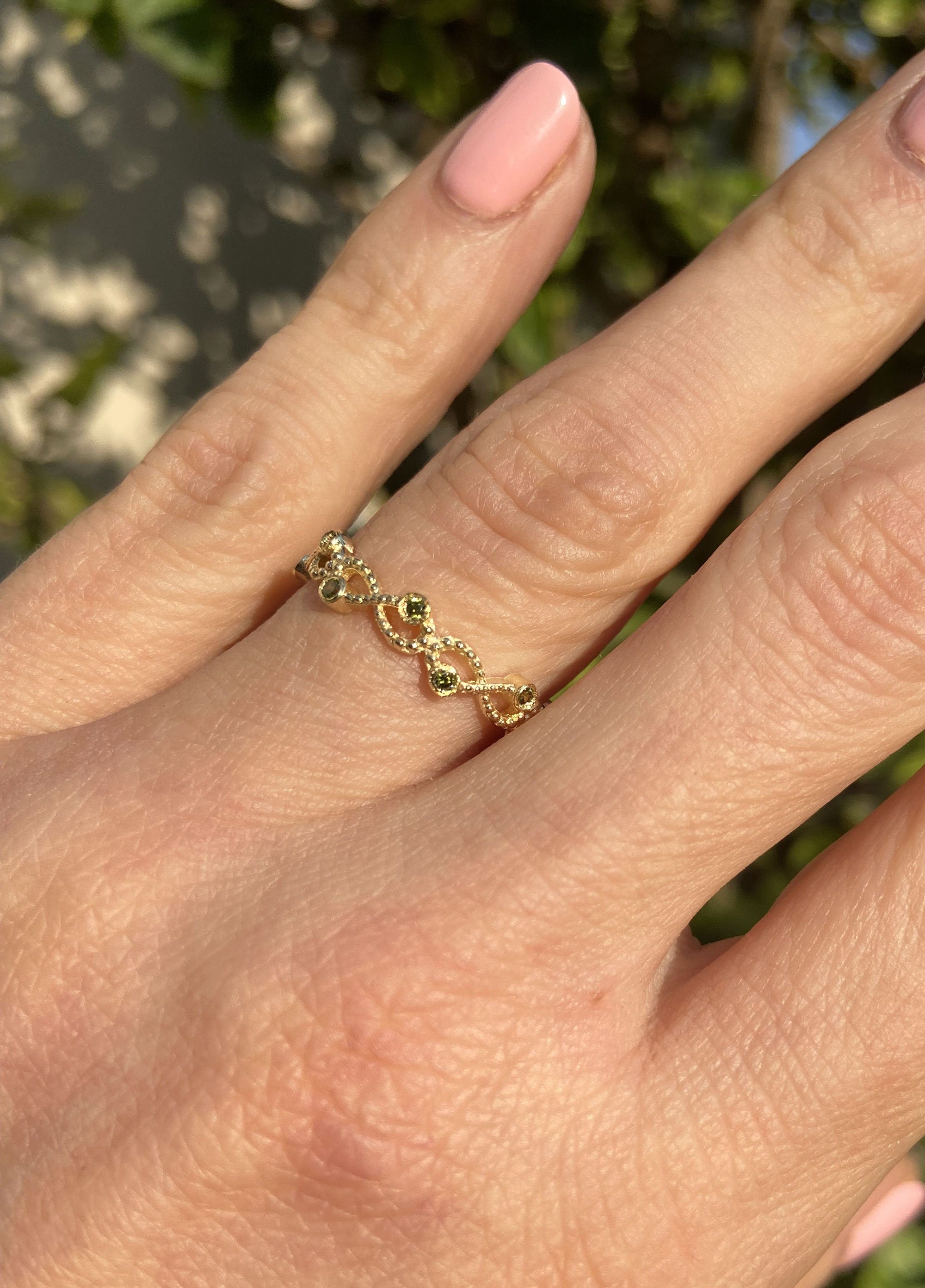 Peridot Ring - August Birthstone - Infinity Ring with Ten Small Round Peridot Gemstones - H.L.Jewelry