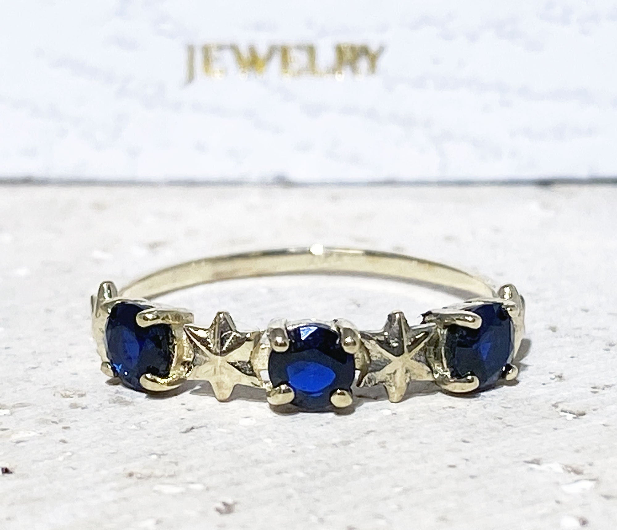 Blue Sapphire Ring - September Birthstone - Delicate Ring with Three Blue Sapphire Gemstones and Star Accents - H.L.Jewelry