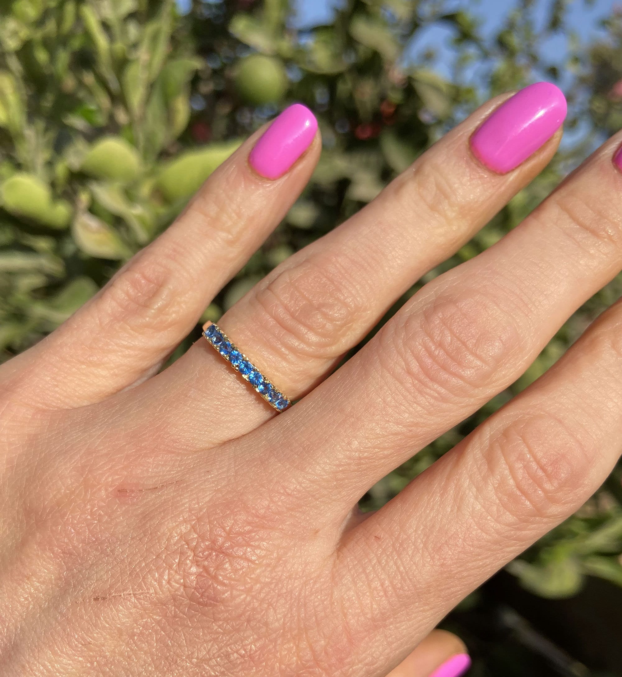 Blue Topaz Ring - December Birthstone - Delicate Stacking Half Eternity Ring with Nine Round Blue Topaz Gemstones - H.L.Jewelry