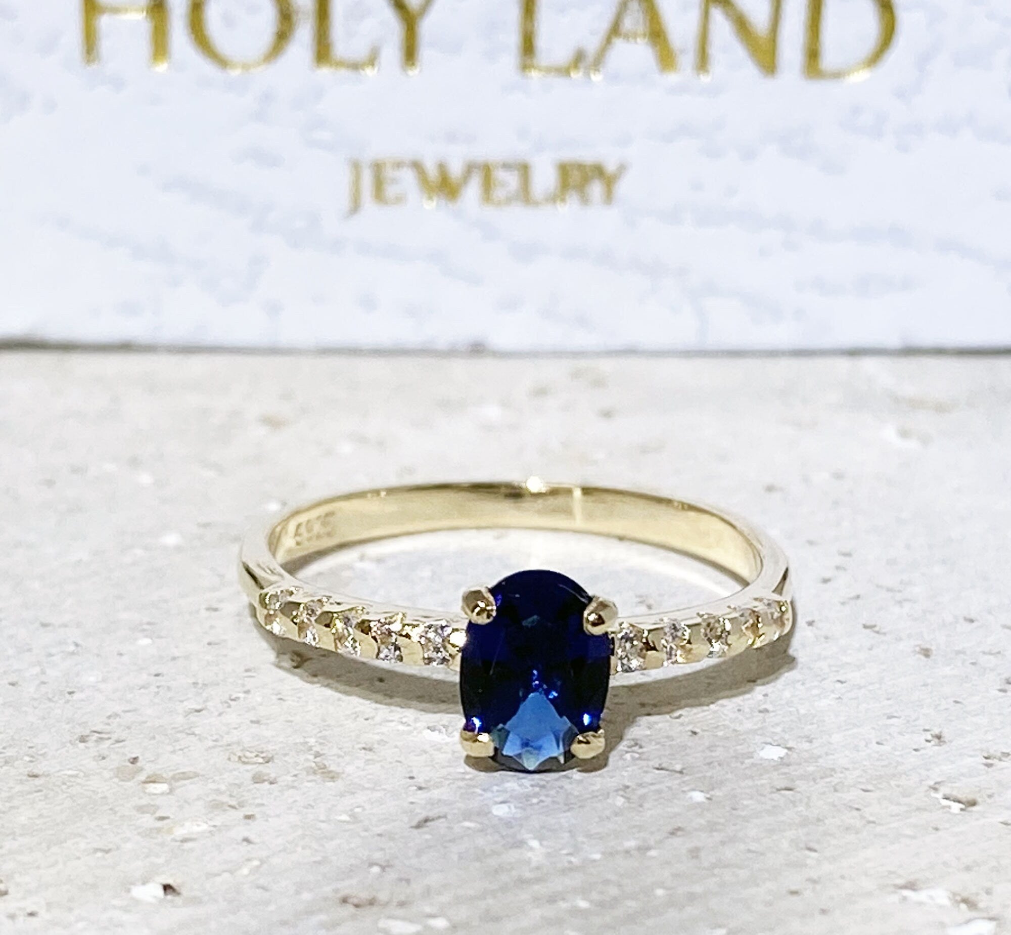 Blue Sapphire Ring - September Birthstone - Oval Blue Sapphire Gemstone Ring with Clear Quartz Accents - H.L.Jewelry