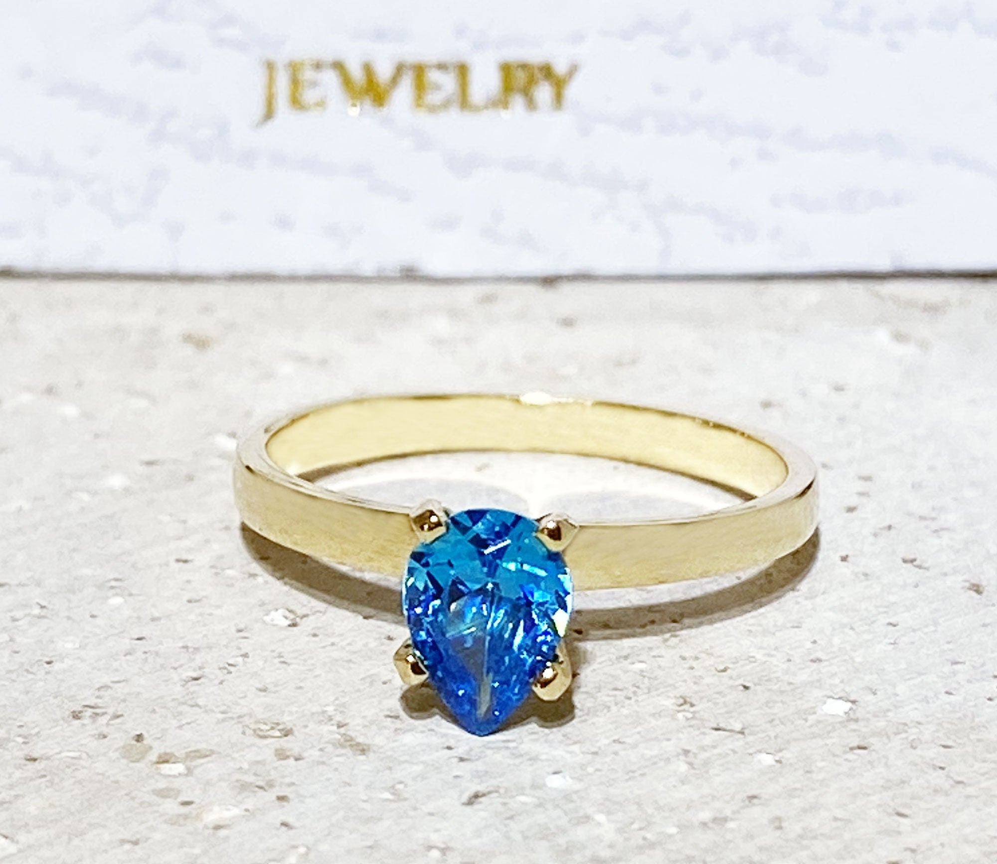 Blue Topaz Ring - December Birthstone - Solitaire Ring with Pear-Shaped Blue Topaz Gemstone - H.L.Jewelry