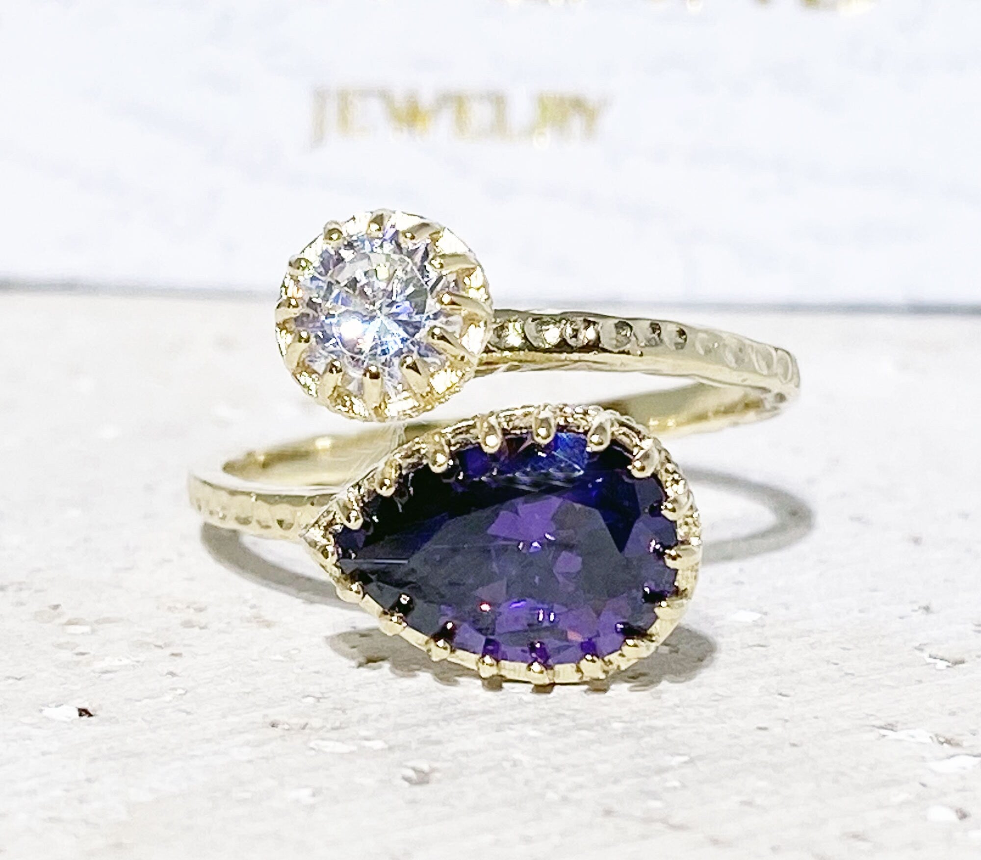 Dual Gemstone Ring - Two Birthstone Ring - Hammered Band Ring with Pear-Shaped Purple Amethyst and Round Clear Quartz - H.L.Jewelry