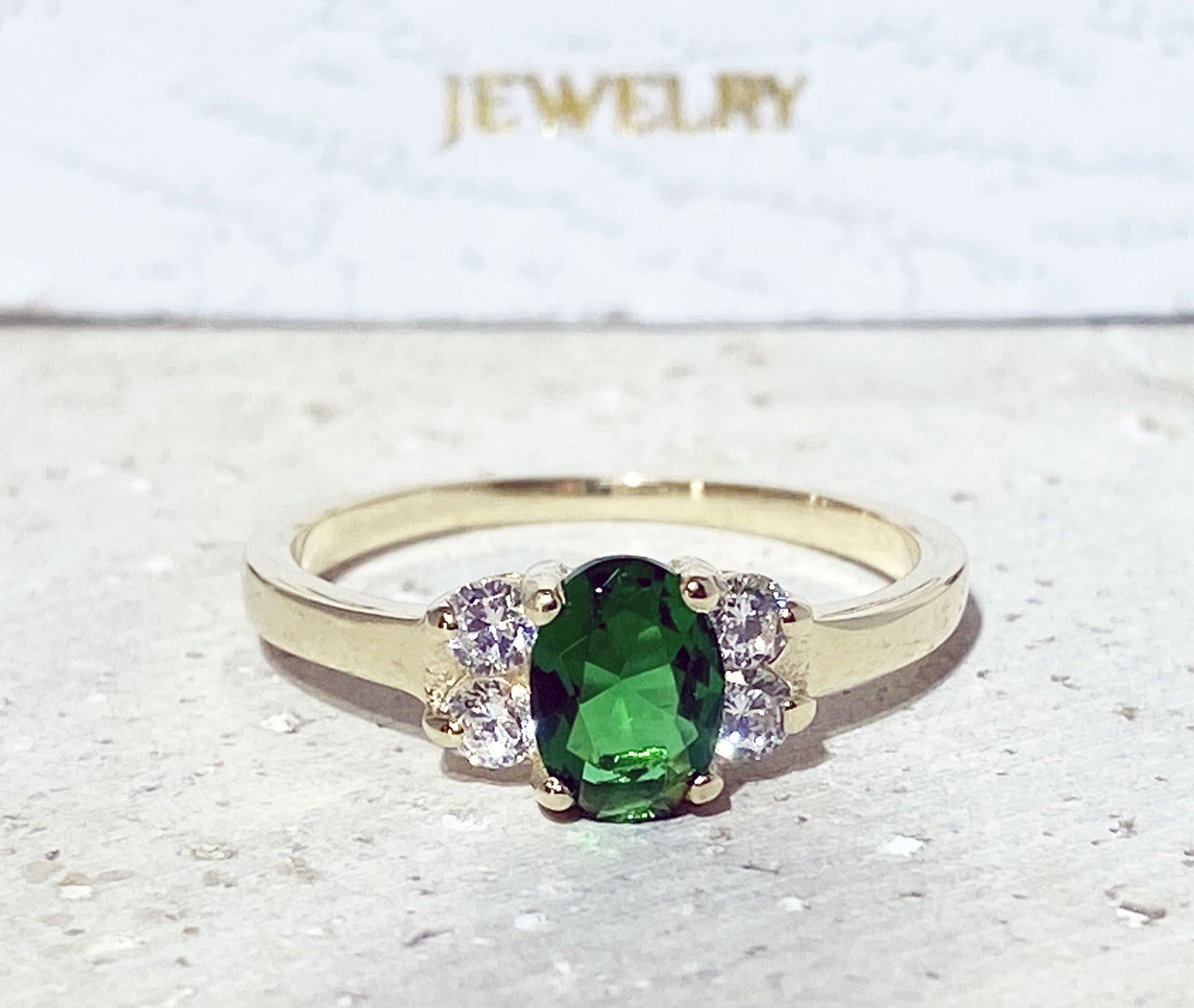 Emerald Ring - May Birthstone - Delicate Ring with Oval Emerald Gemstone and Clear Quartz Accents - H.L.Jewelry