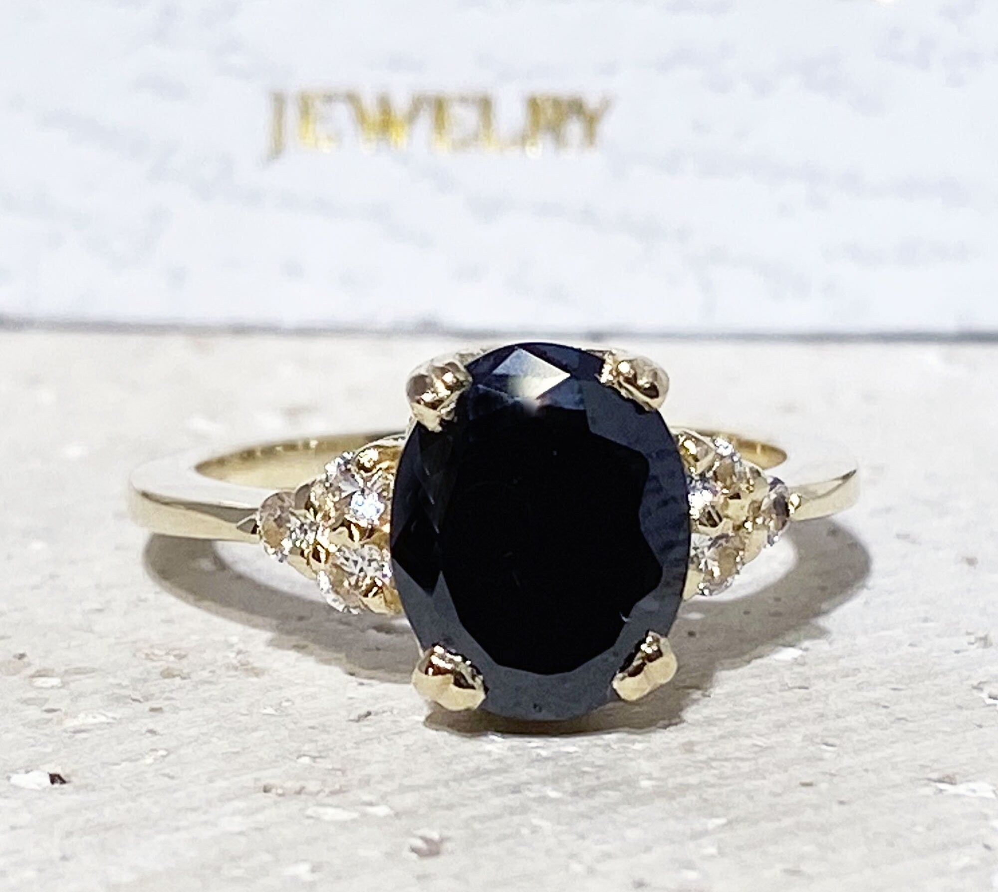 Black Onyx Ring - December Birthstone - Statement Engagement Ring with Oval Black Onyx Gemstone and Clear Quartz Accents - H.L.Jewelry