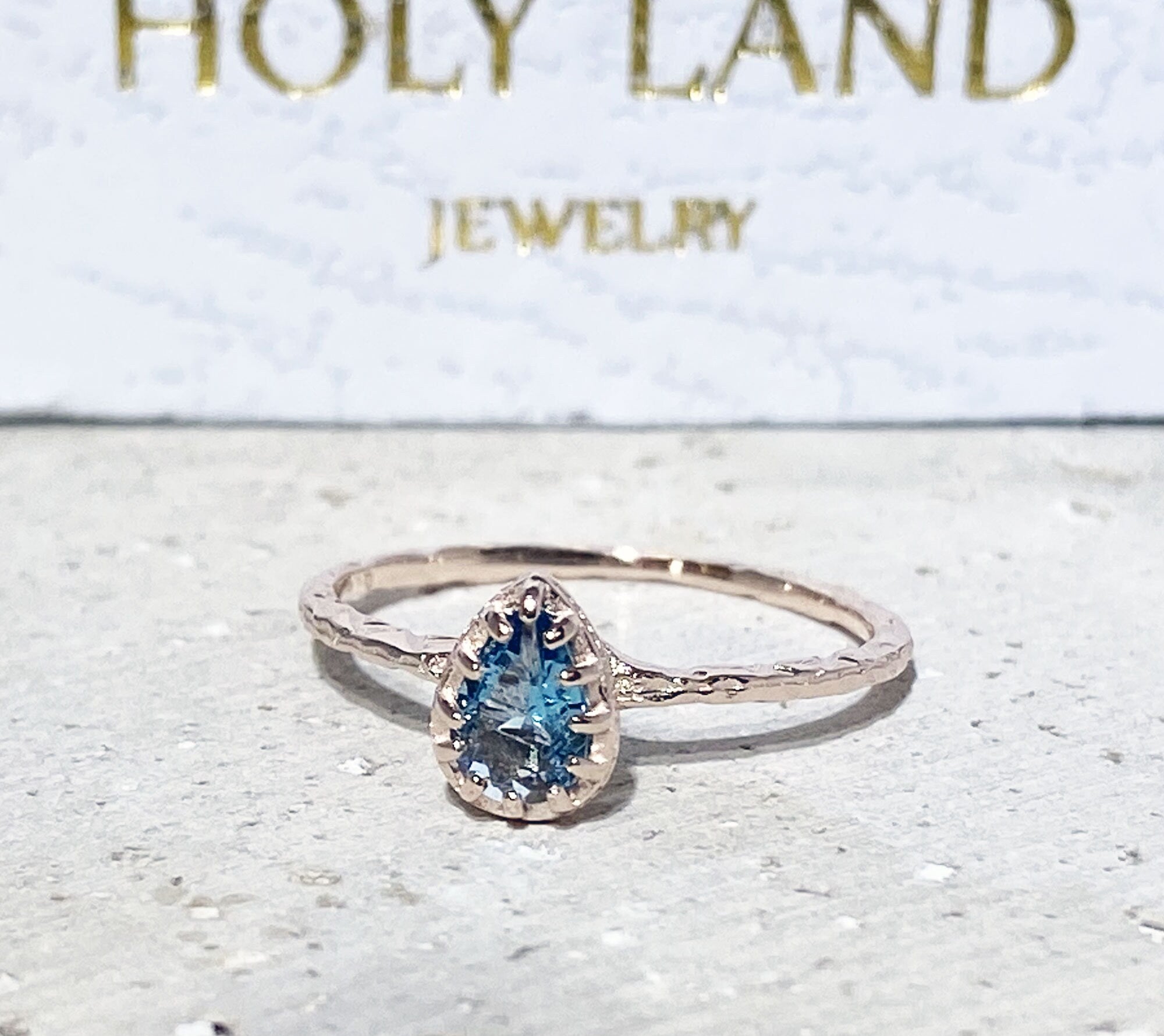 Blue Topaz Ring - December Birthstone - Delicate Hammered Ring with Pear-Shaped Blue Topaz Gemstone - H.L.Jewelry