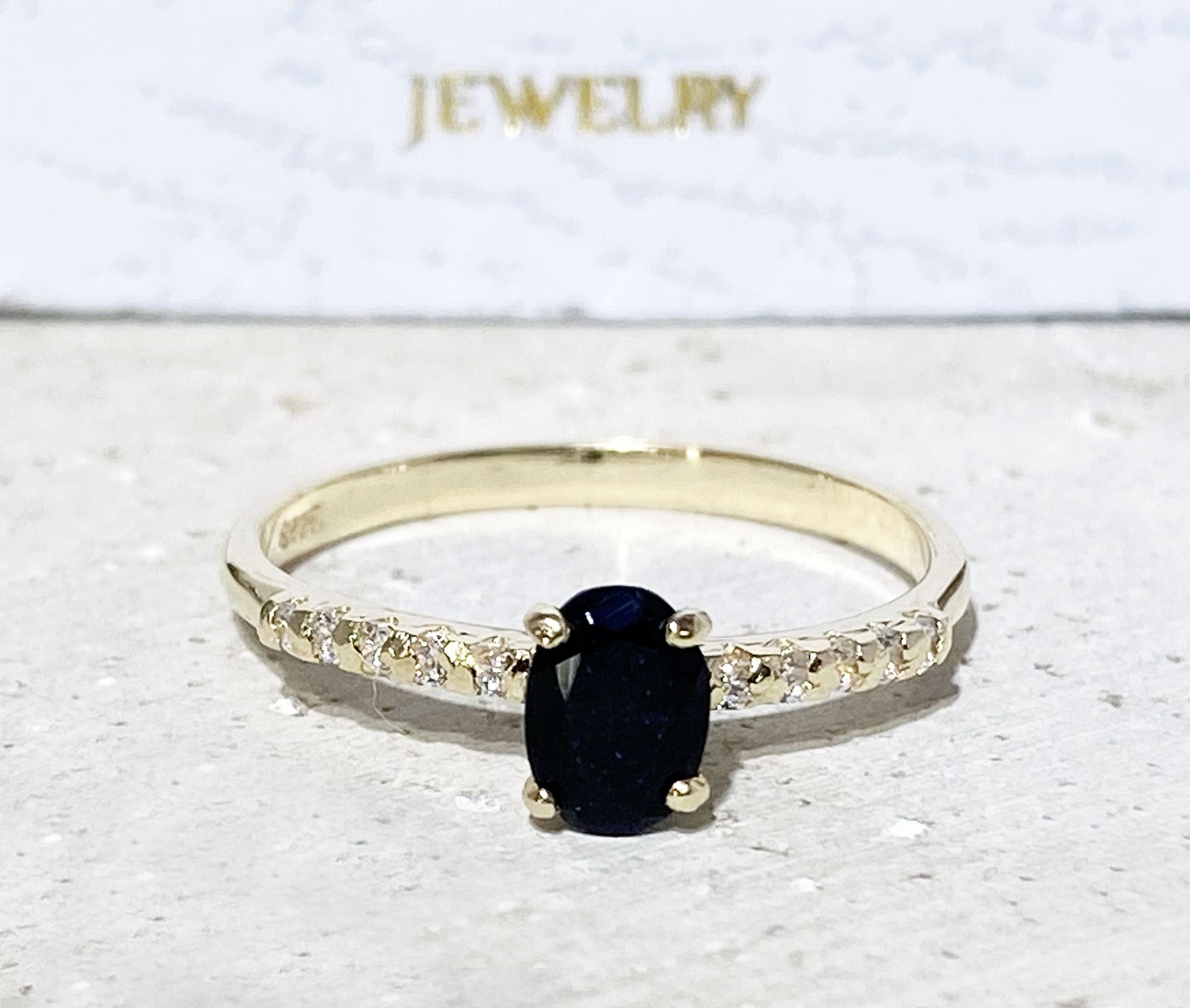 Black Onyx Ring - December Birthstone - Delicate Engagement Ring with Oval Black Onyx Center Gemstone and Clear Quartz Accents - H.L.Jewelry