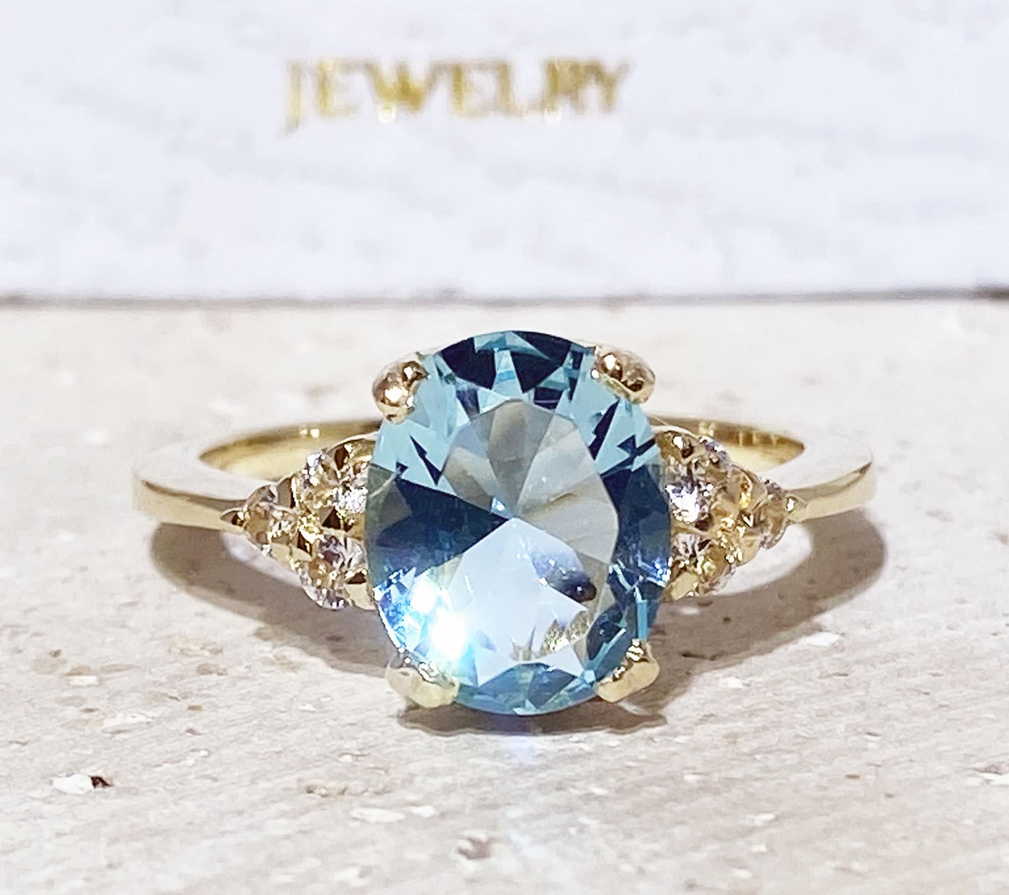 Aquamarine Ring - March Birthstone - Statement Engagement Ring with Oval Aquamarine Gemstone and Clear Quartz Accents - H.L.Jewelry