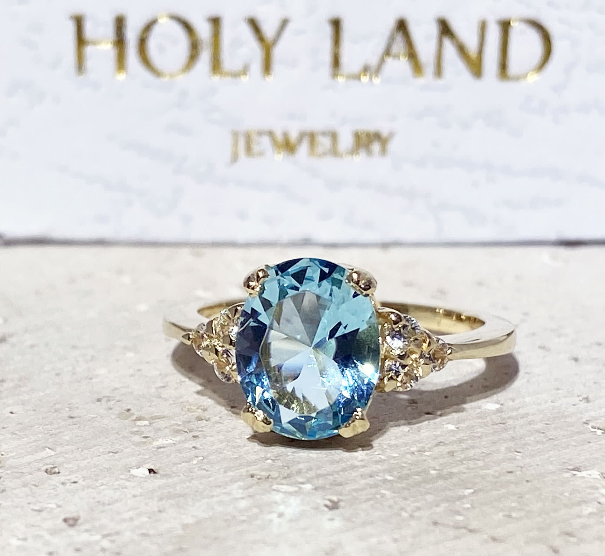 Aquamarine Ring - March Birthstone - Statement Engagement Ring with Oval Aquamarine Gemstone and Clear Quartz Accents - H.L.Jewelry