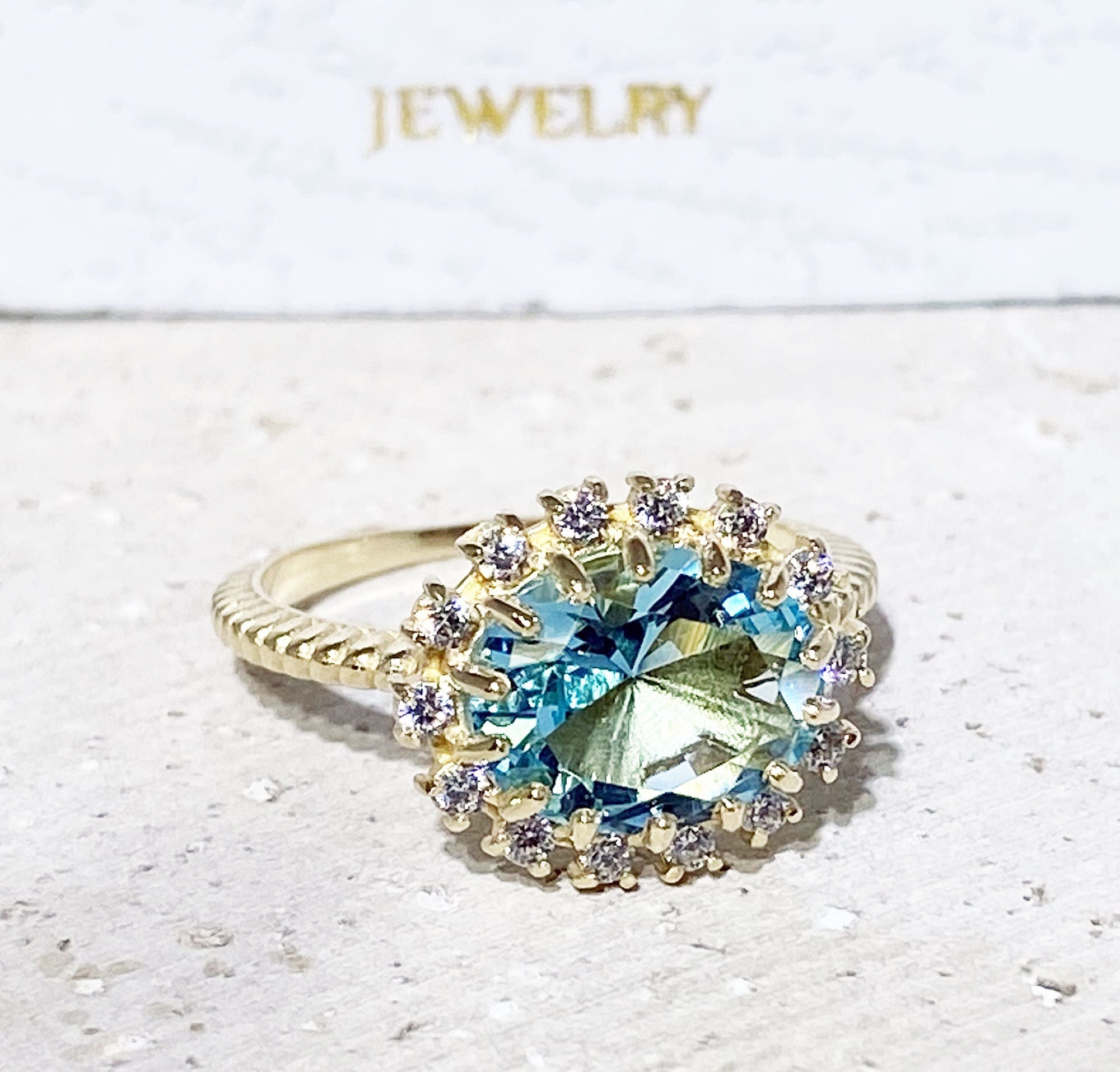 Aquamarine Ring - March Birthstone - Engagement Ring with Oval Aquamarine Center Stone and Clear Quartz Halo - H.L.Jewelry