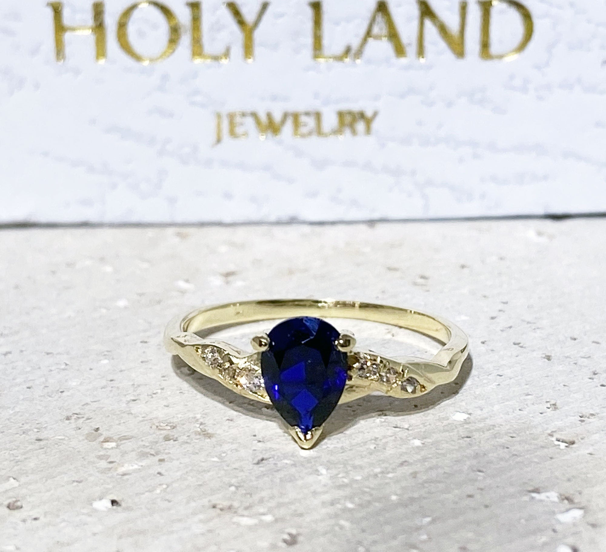 Blue Sapphire Ring - September Birthstone - Tiny Delicate Ring with Pear-Shaped Blue Sapphire Gemstone and Clear Quartz Accents - H.L.Jewelry