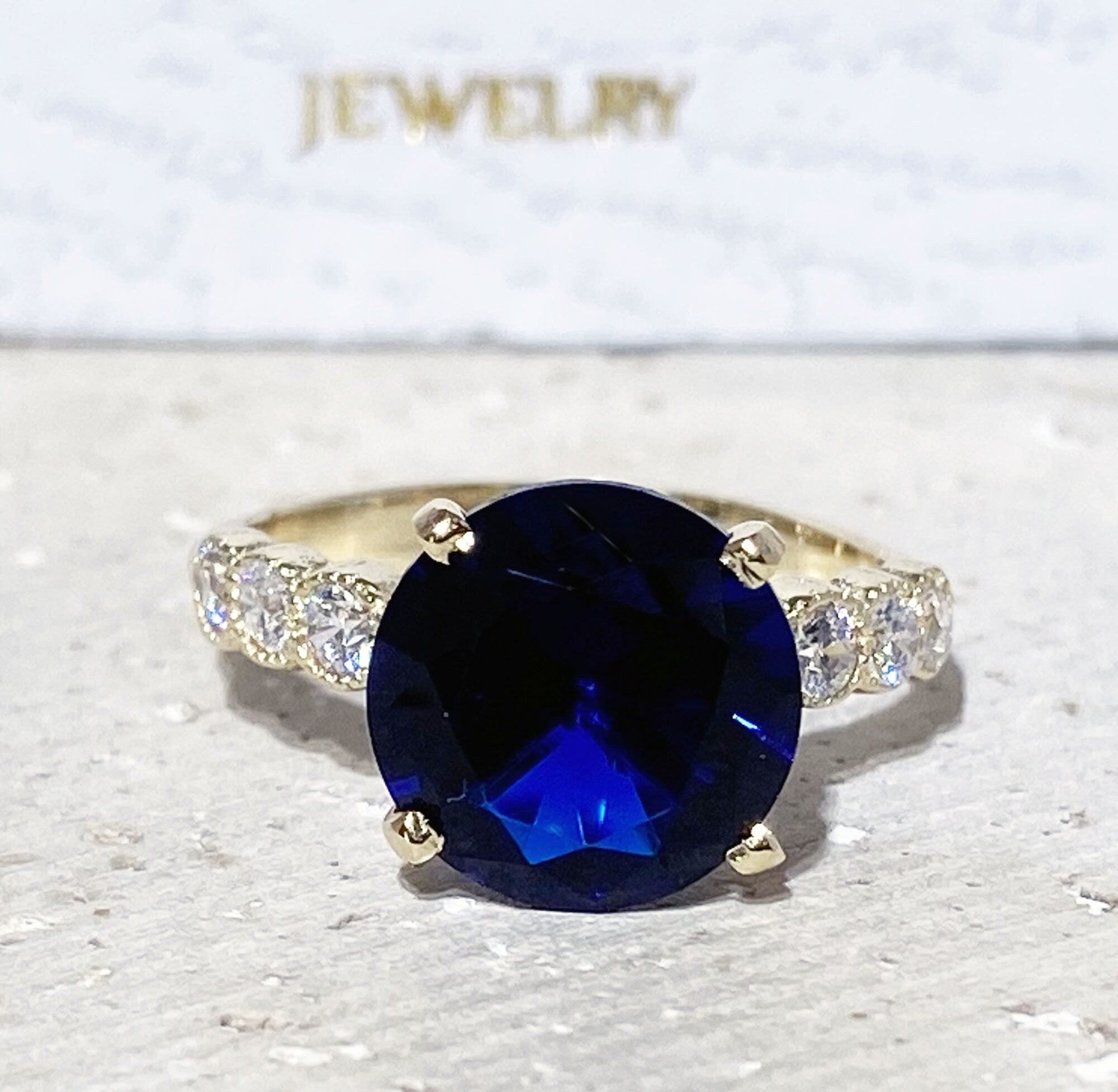 Blue Sapphire Ring - September Birthstone - Round Blue Sapphire Statement Engagement Ring with Clear Quartz Accents - H.L.Jewelry