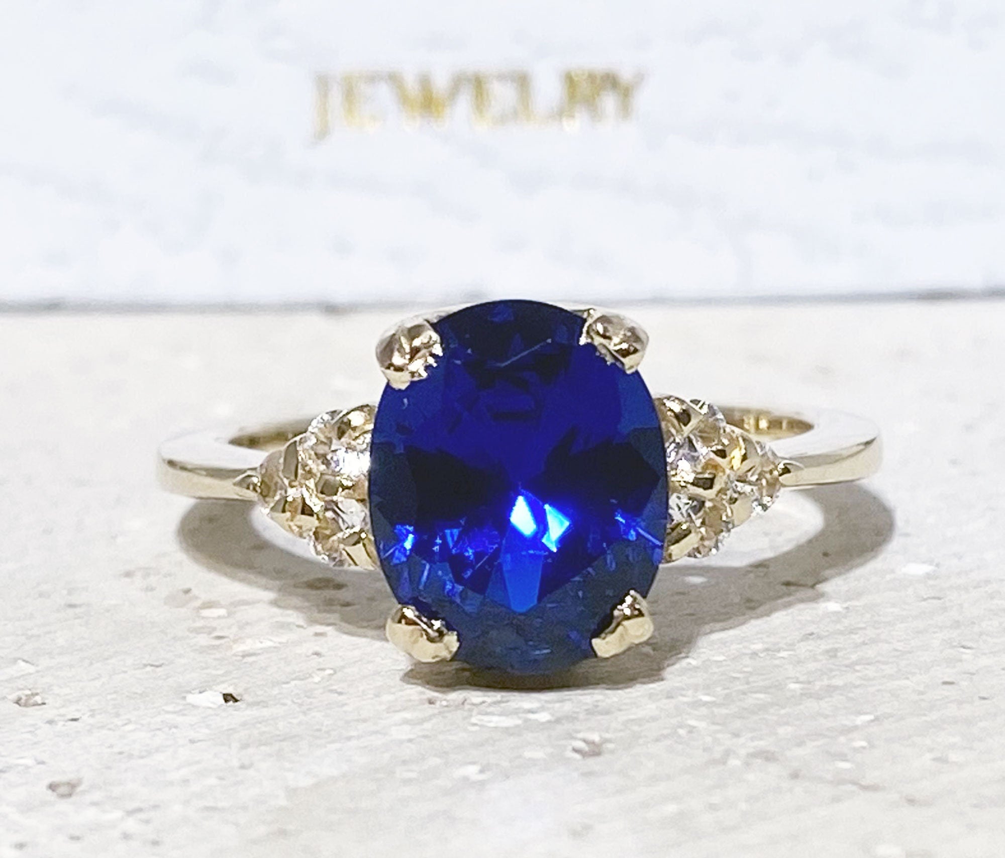 Blue Sapphire Ring - September Birthstone - Oval Blue Sapphire Statement Engagement Ring with Clear Quartz Accents - H.L.Jewelry