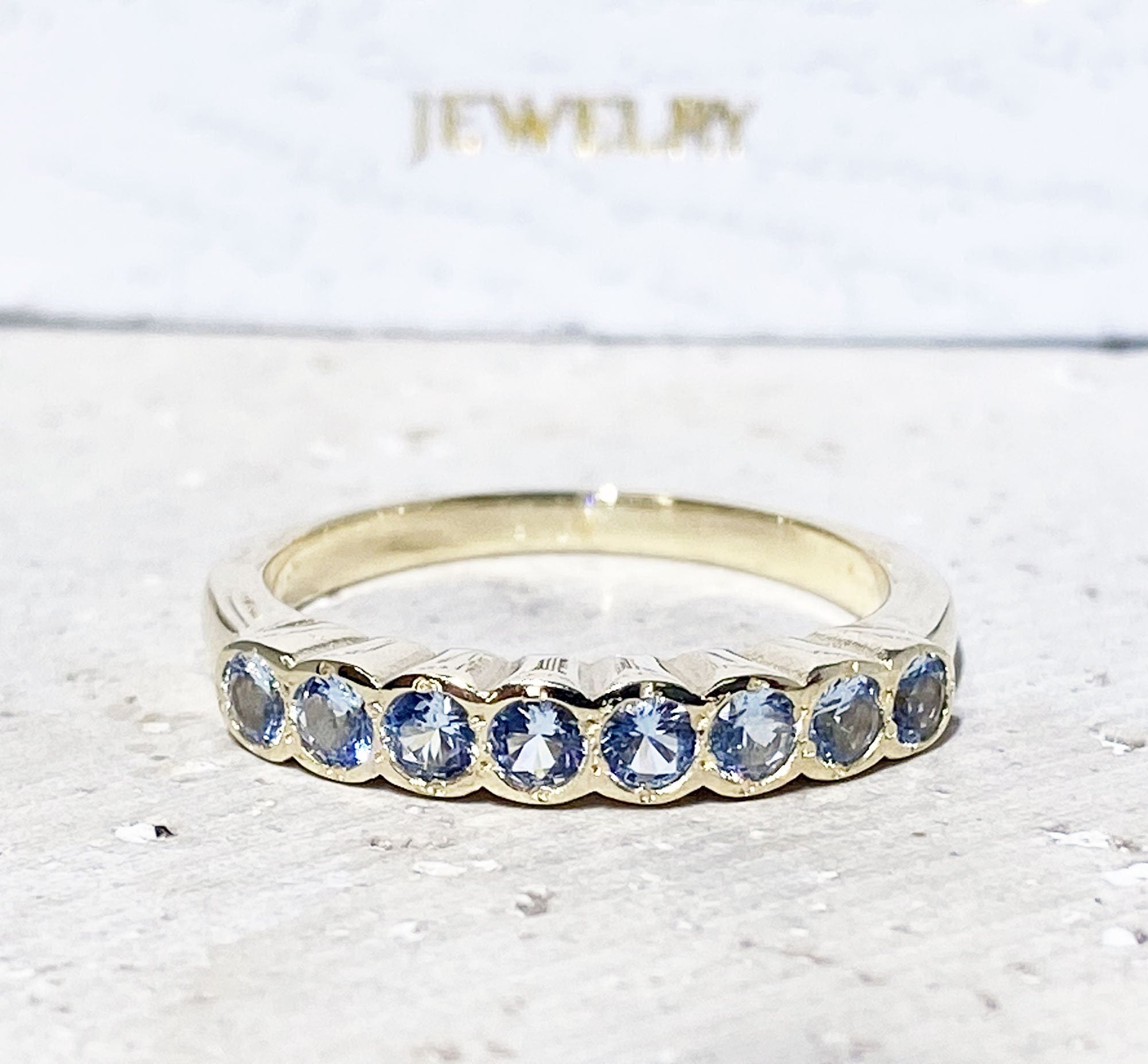 Aquamarine Ring - March Birthstone - Stacking Ring with Eight Round Aquamarine Gemstones - H.L.Jewelry