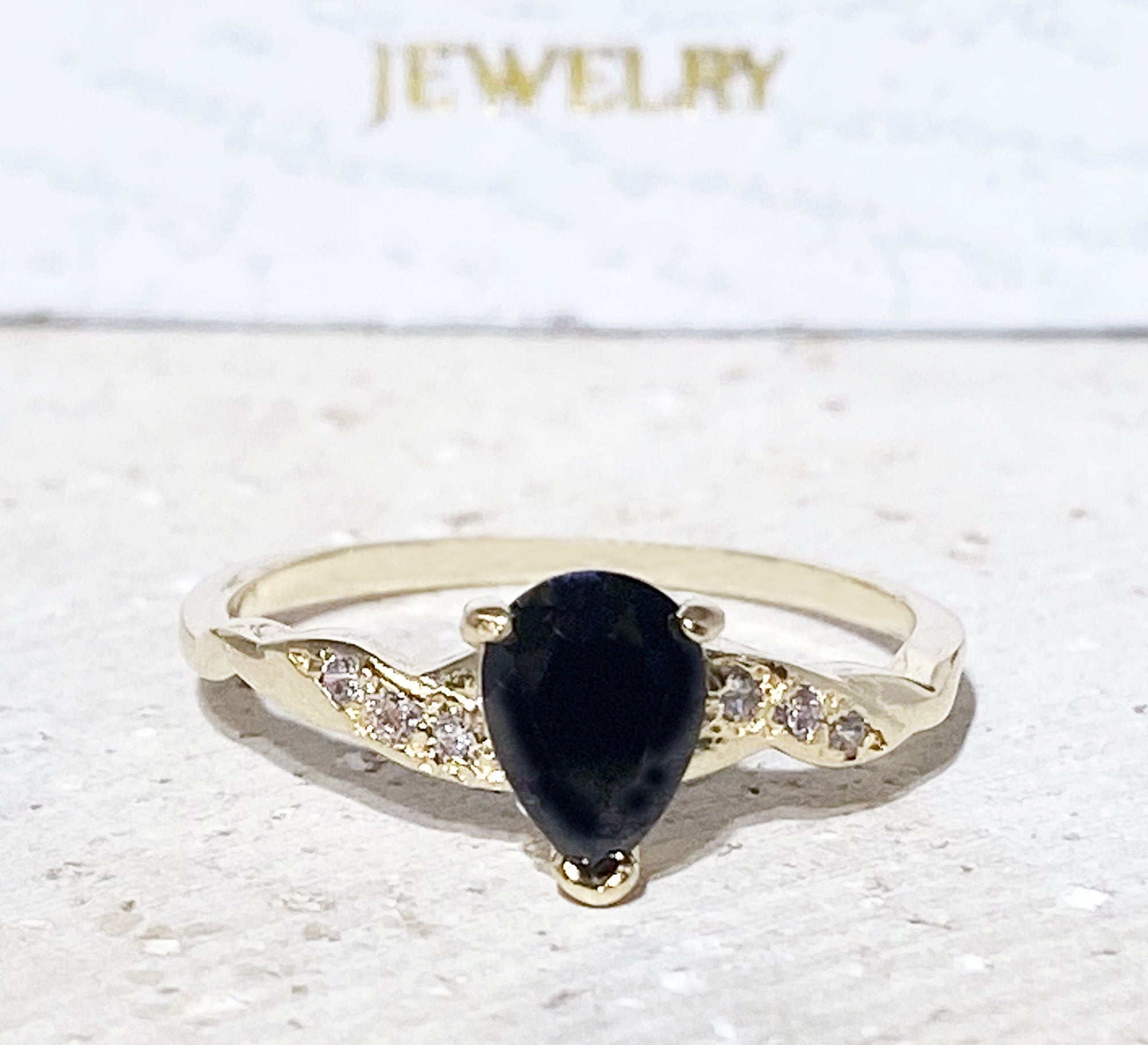 Black Onyx Ring - December Birthstone - Delicate Ring with Pear Shape Black Onyx Center Gemstone and Clear Quartz Accents - H.L.Jewelry