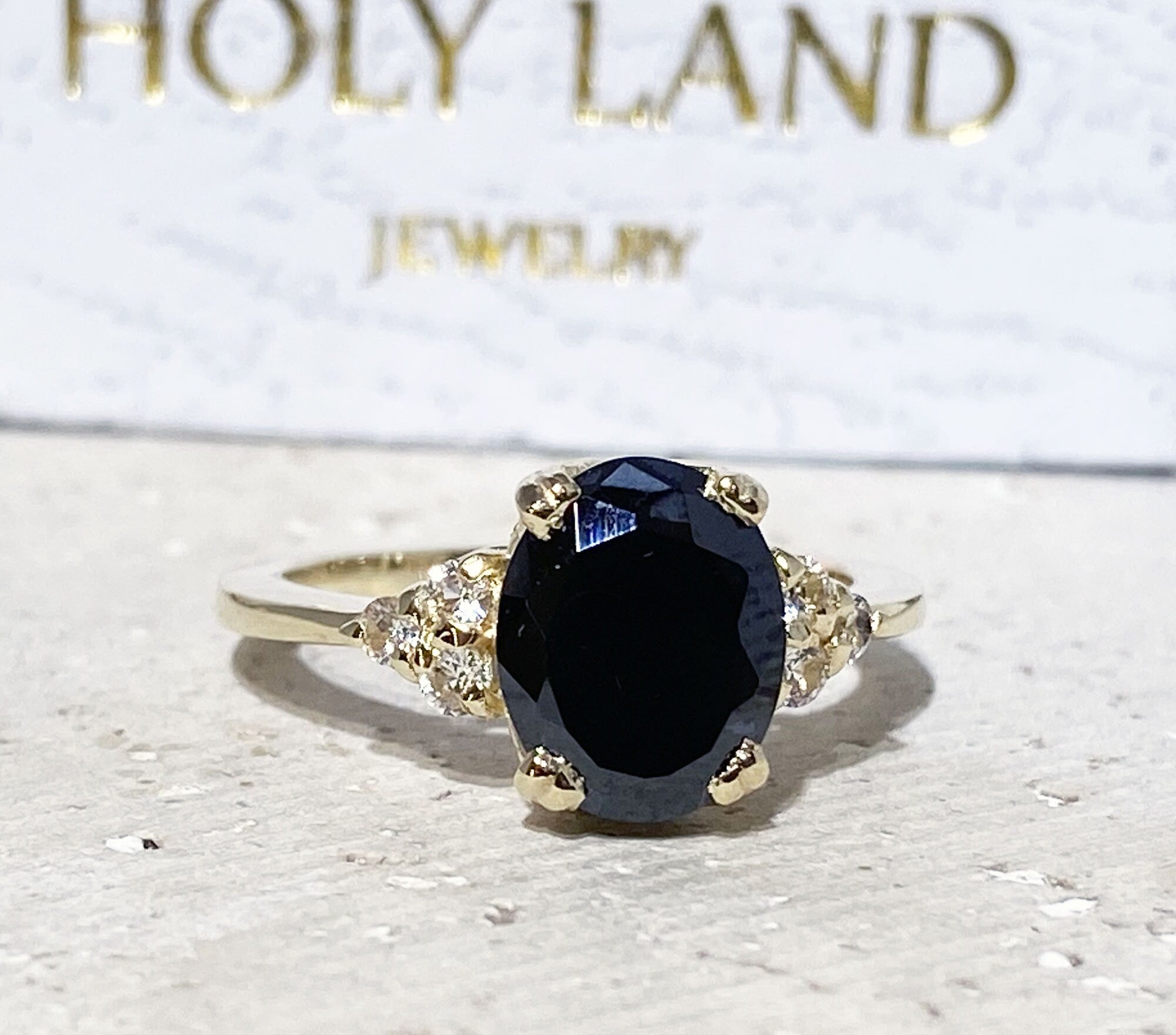 Black Onyx Ring - December Birthstone - Statement Engagement Ring with Oval Black Onyx Gemstone and Clear Quartz Accents - H.L.Jewelry