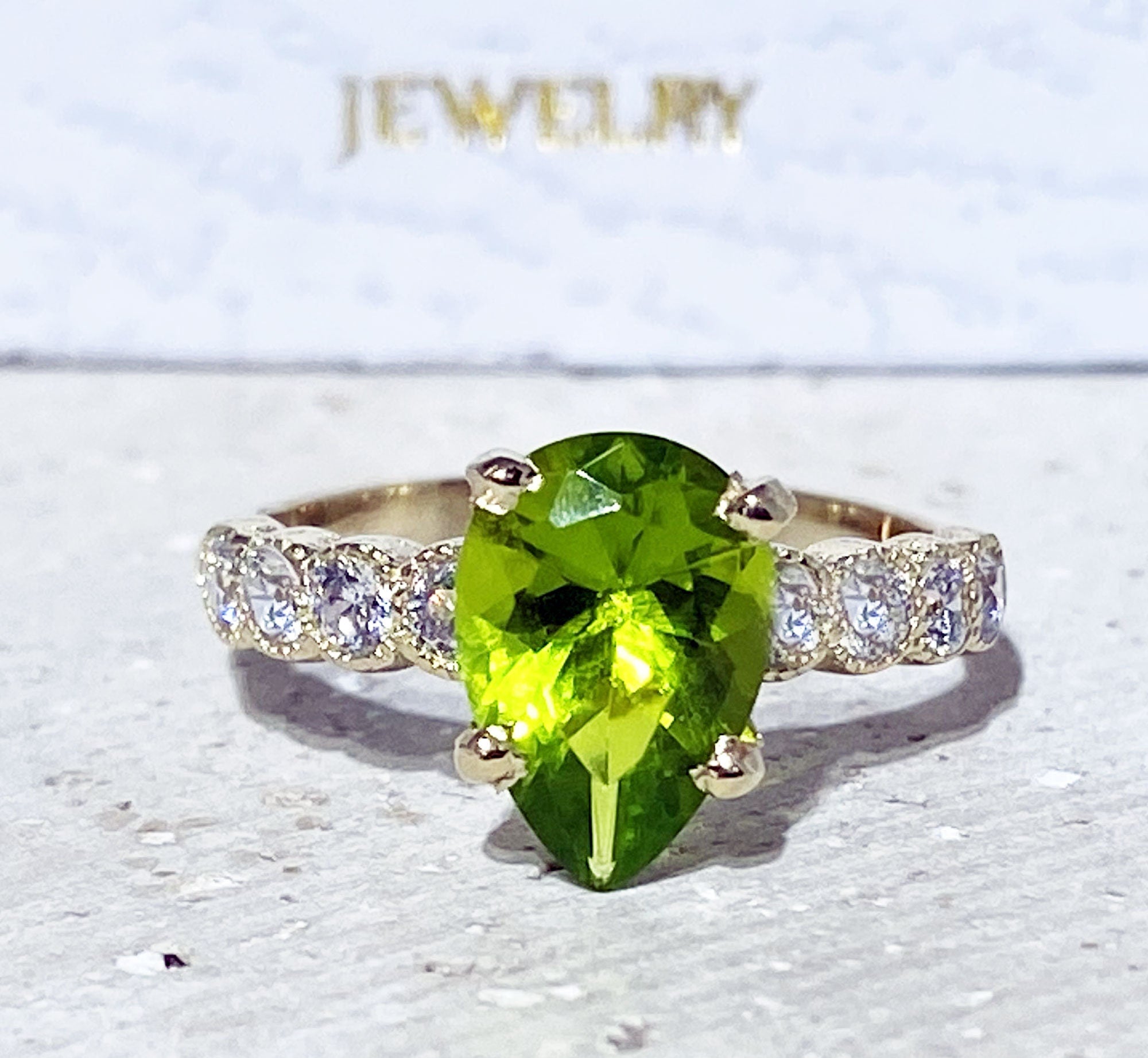 Peridot Ring - August Birthstone - Statement Engagement Ring with Pear-Shaped Peridot Gemstone and Clear Quartz Accents - H.L.Jewelry