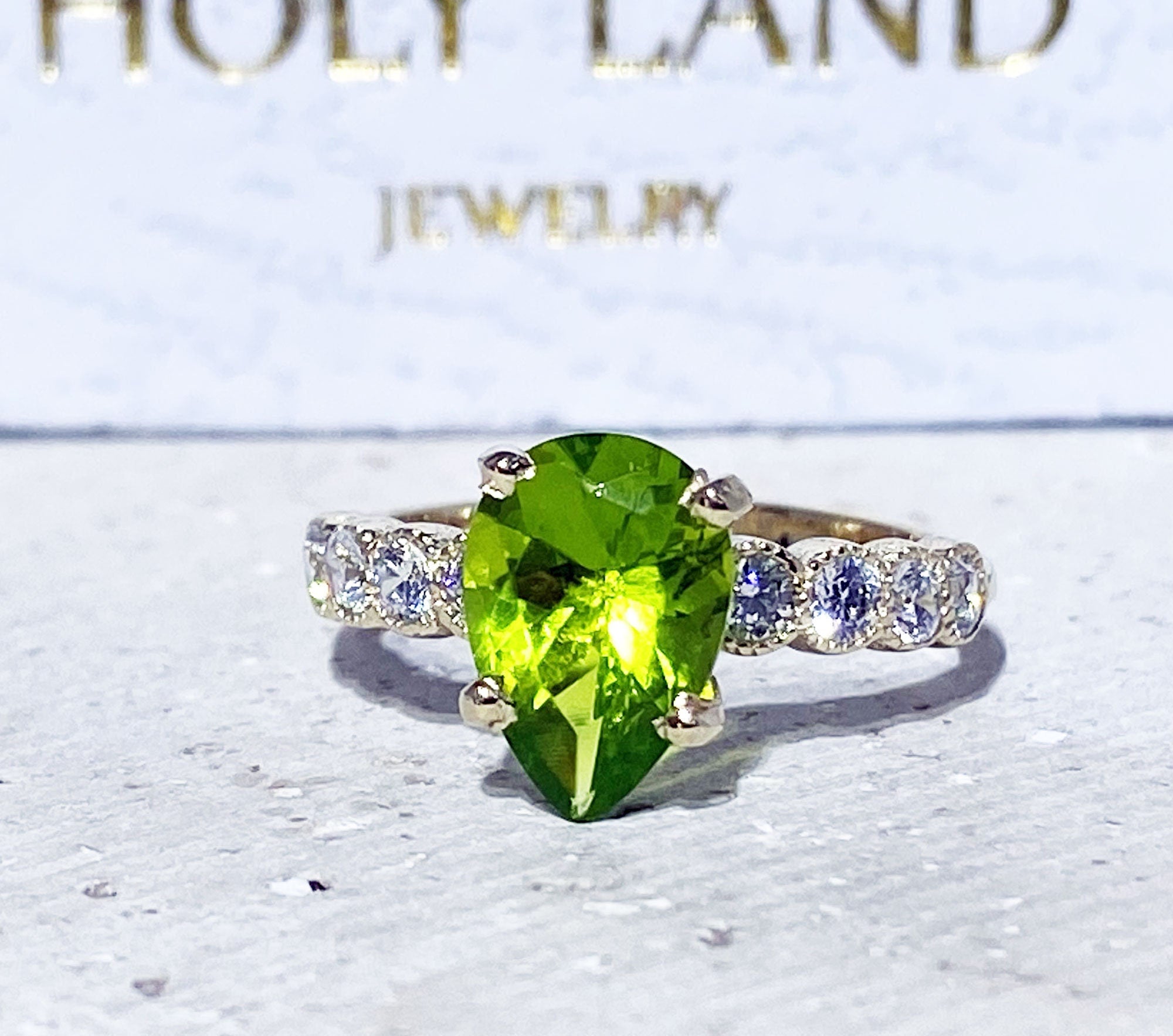 Peridot Ring - August Birthstone - Statement Engagement Ring with Pear-Shaped Peridot Gemstone and Clear Quartz Accents - H.L.Jewelry