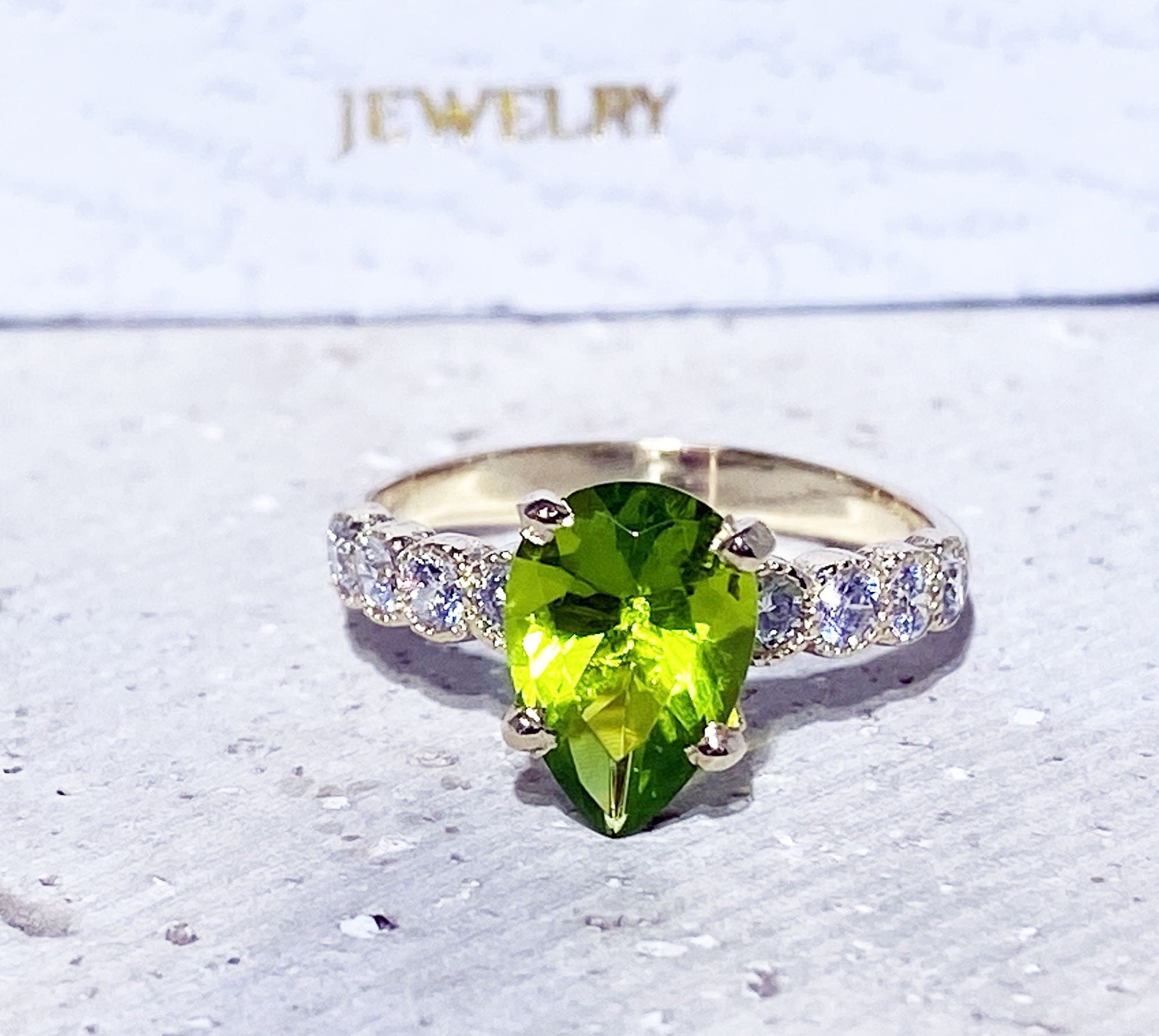 Peridot Ring - August Birthstone - Statement Engagement Ring with Pear-Shaped Peridot Gemstone and Clear Quartz Accents - H.L.Jewelry