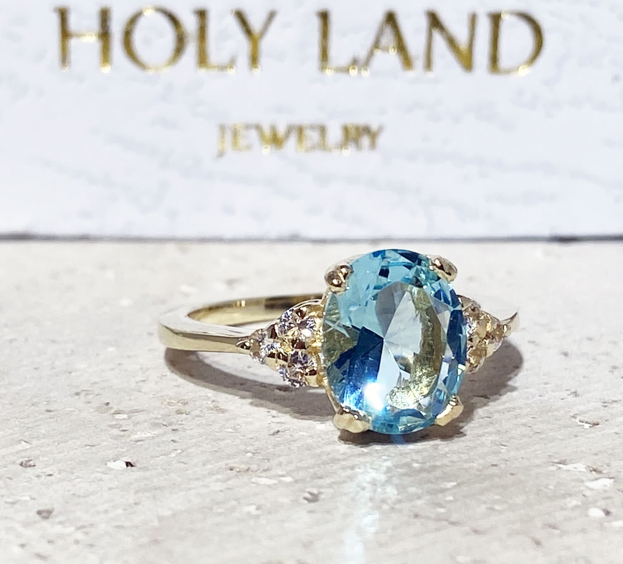 Aquamarine Ring - March Birthstone - Statement Engagement Ring with Oval Aquamarine Gemstone and Clear Quartz Accents - H.L.Jewelry