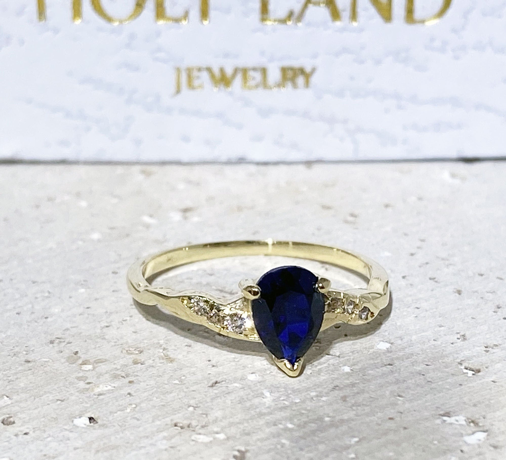 Blue Sapphire Ring - September Birthstone - Tiny Delicate Ring with Pear-Shaped Blue Sapphire Gemstone and Clear Quartz Accents - H.L.Jewelry