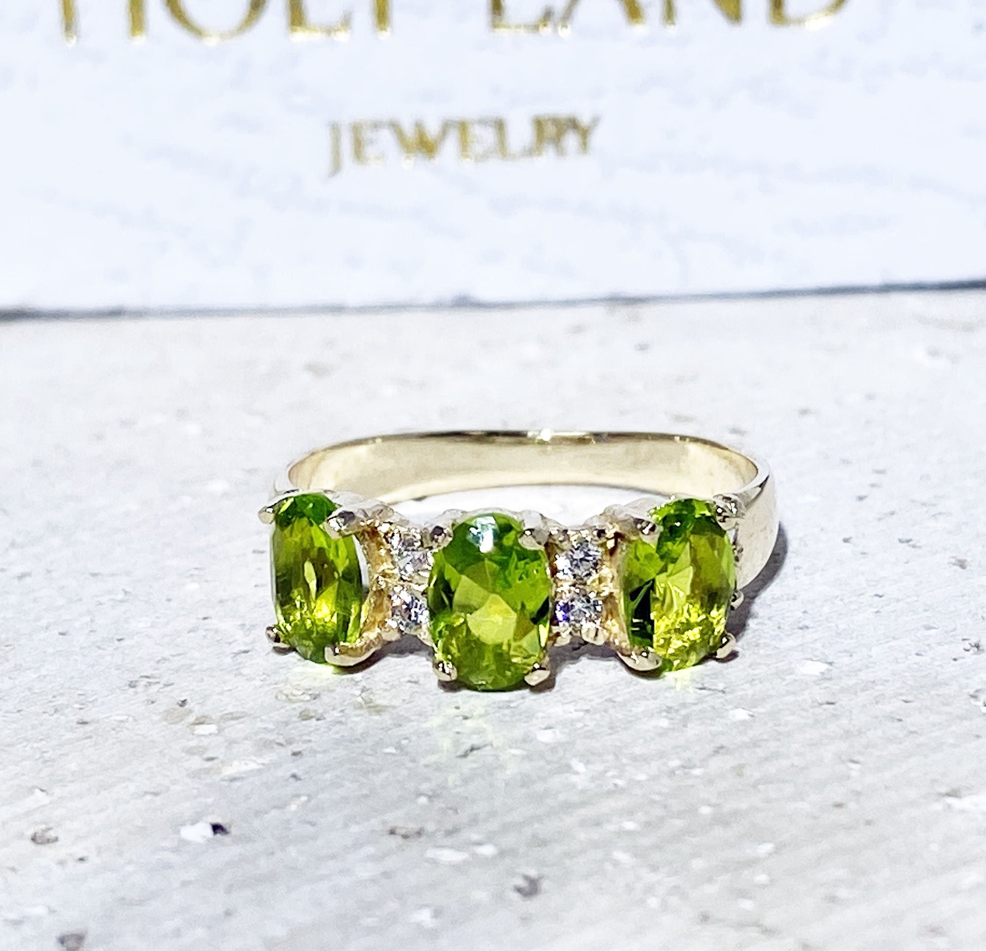 Peridot Ring - August Birthstone - Ring with Three Oval Peridot Gemstones and Clear Quartz Accents - H.L.Jewelry