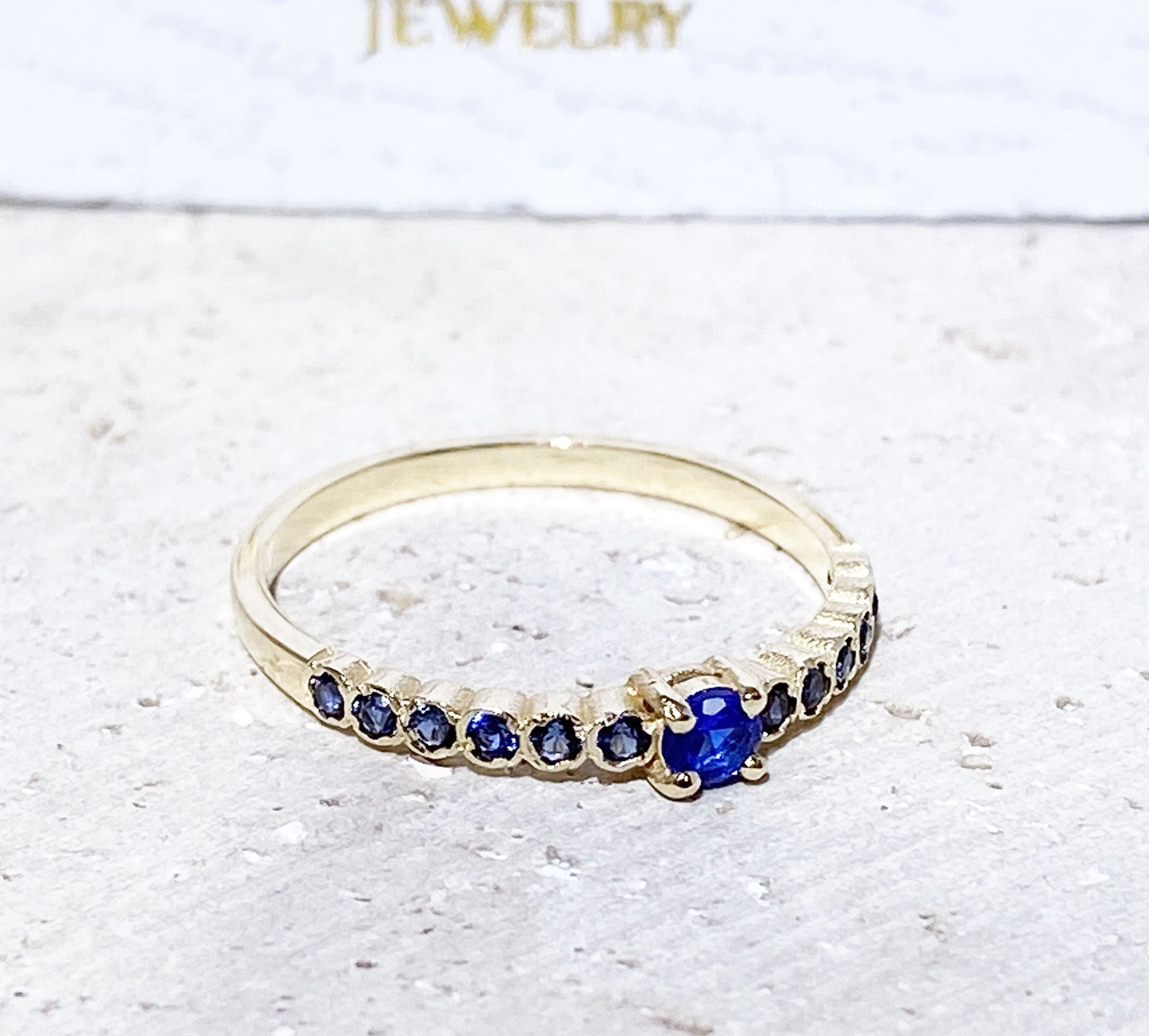 Blue Sapphire Ring - September Birthstone - Delicate Stacking Half Eternity Ring with Thirteen Round Blue Sapphire Gemstones - H.L.Jewelry