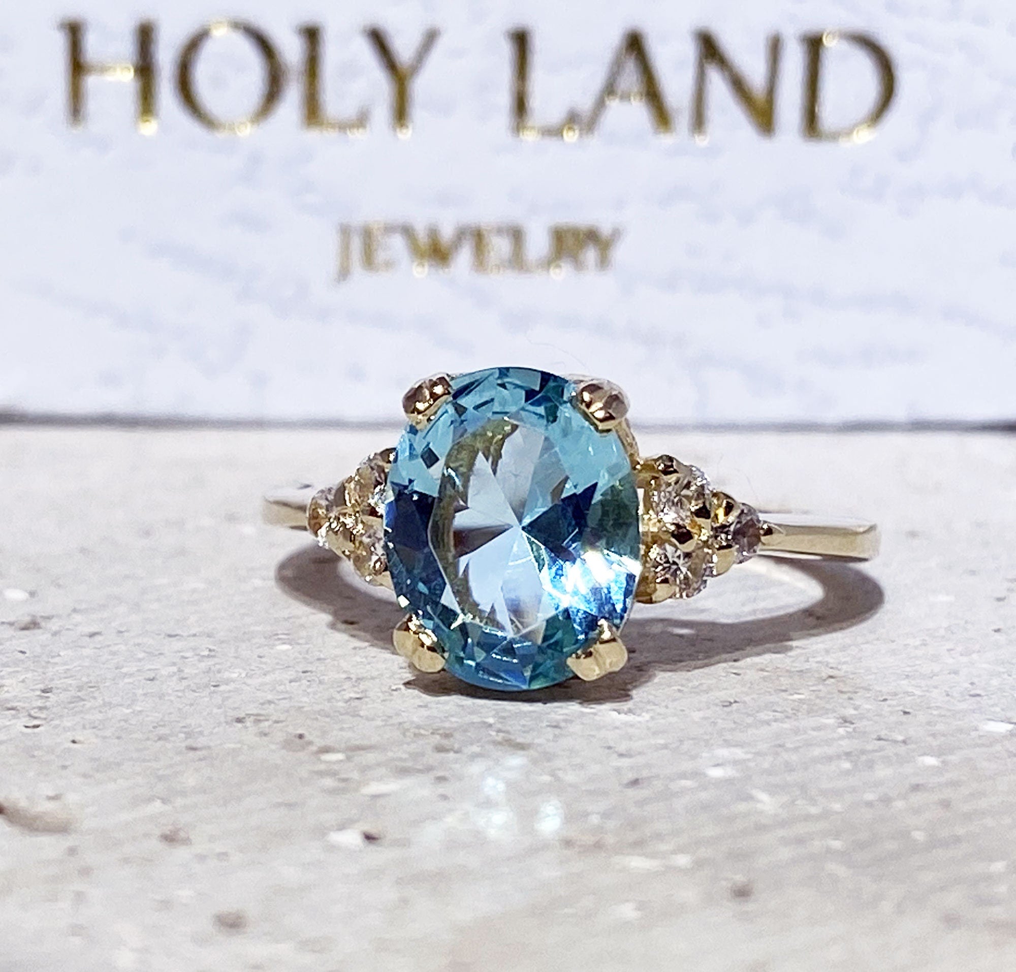 Blue Topaz Ring - December Birthstone - Oval Blue Topaz Statement Engagement Ring with Clear Quartz Accents - H.L.Jewelry