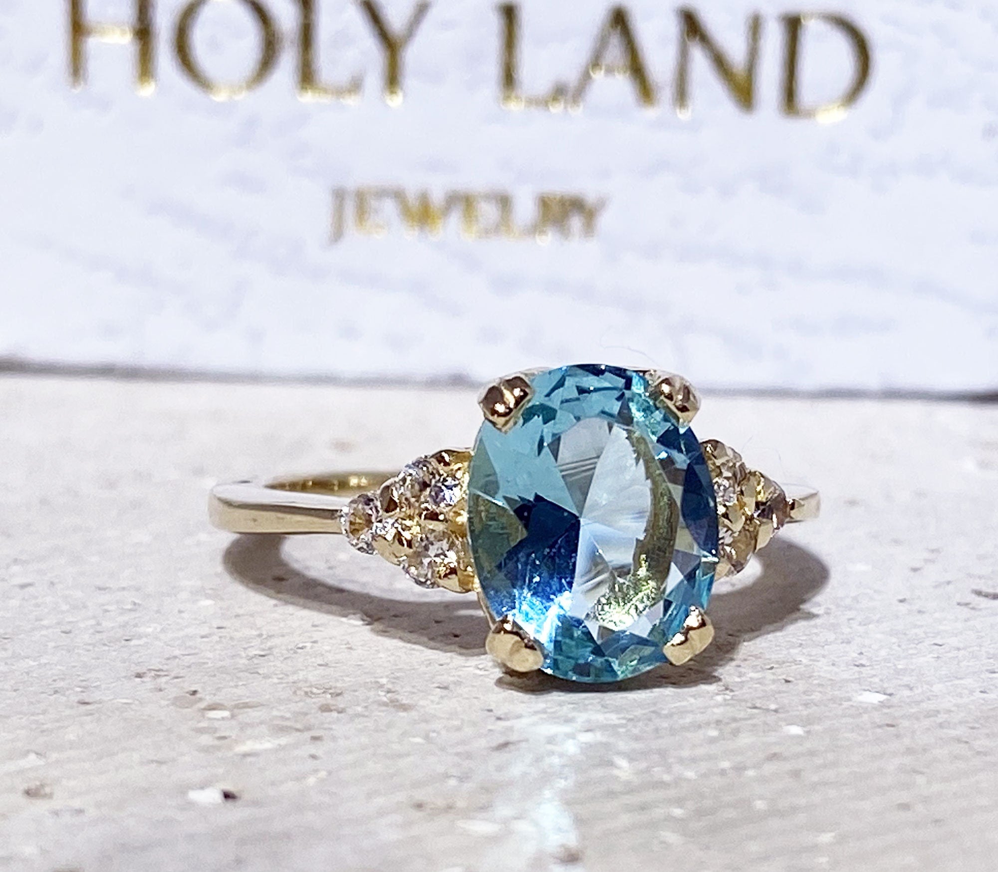 Blue Topaz Ring - December Birthstone - Oval Blue Topaz Statement Engagement Ring with Clear Quartz Accents - H.L.Jewelry