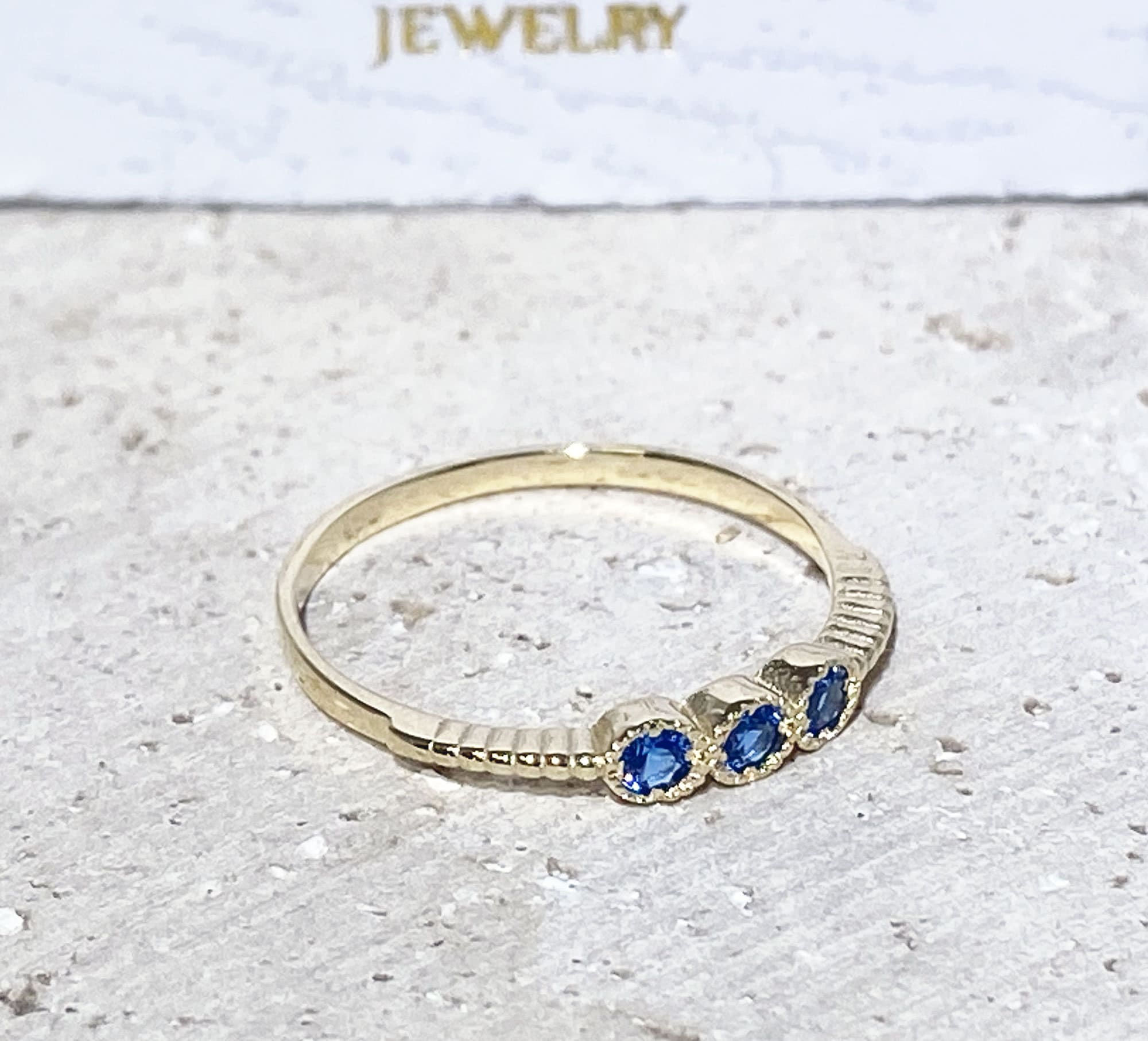 Blue Topaz Ring - December Birthstone - Tiny Stacking Ring with Three Round Blue Topaz Gemstones - H.L.Jewelry