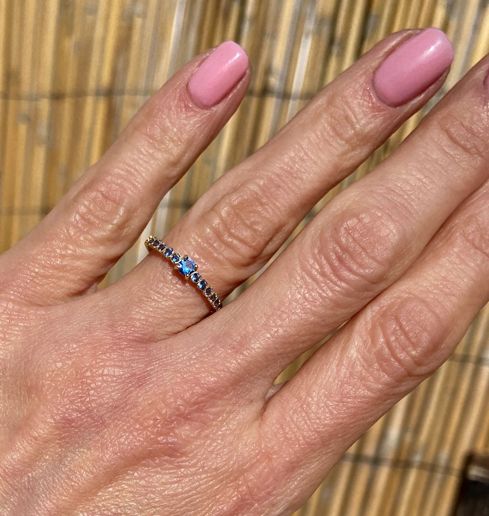 Blue Topaz Ring - December Birthstone - Delicate Stacking Half Eternity Ring with Thirteen Round Blue Topaz Gemstones - H.L.Jewelry