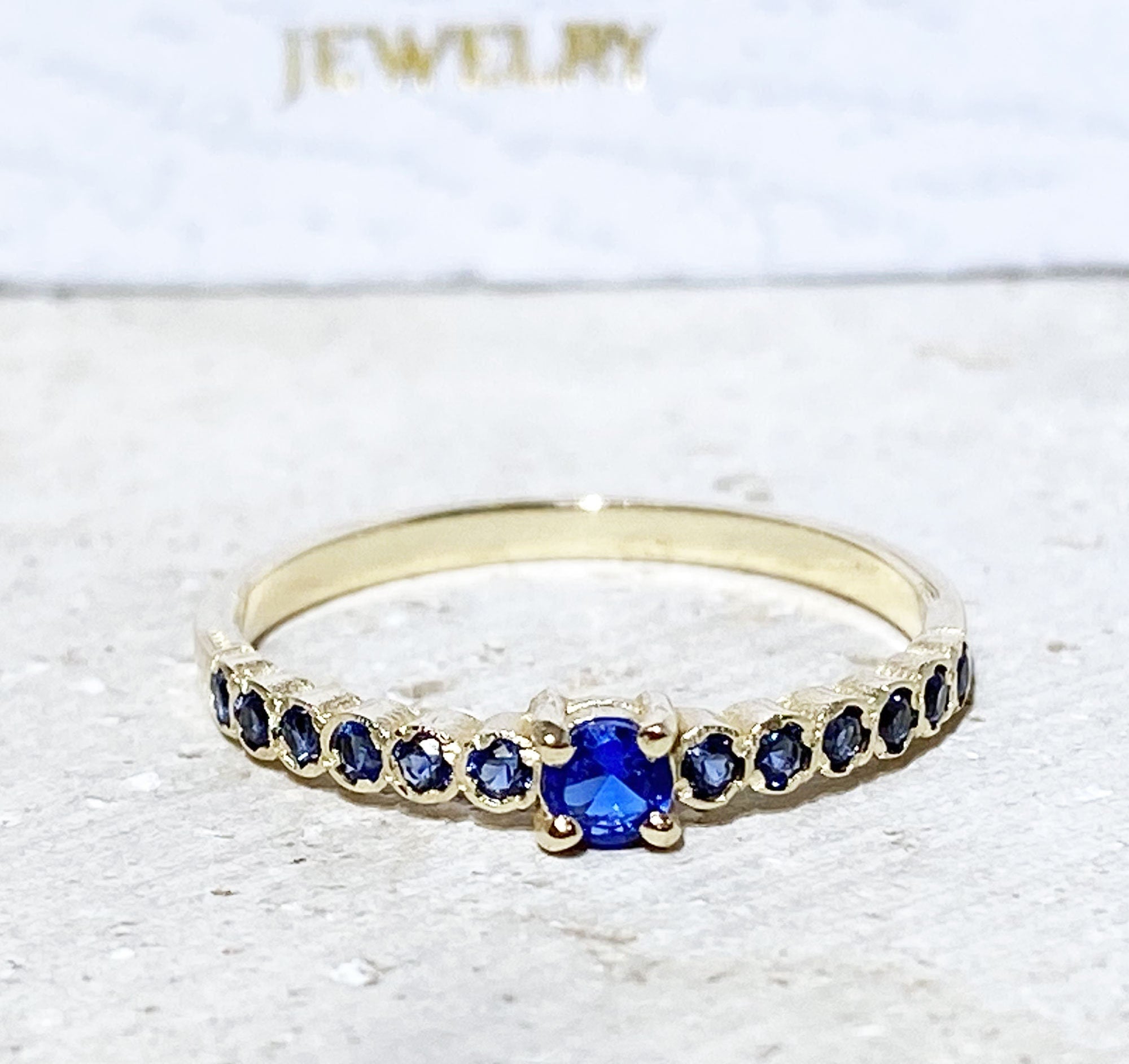 Blue Sapphire Ring - September Birthstone - Delicate Stacking Half Eternity Ring with Thirteen Round Blue Sapphire Gemstones - H.L.Jewelry