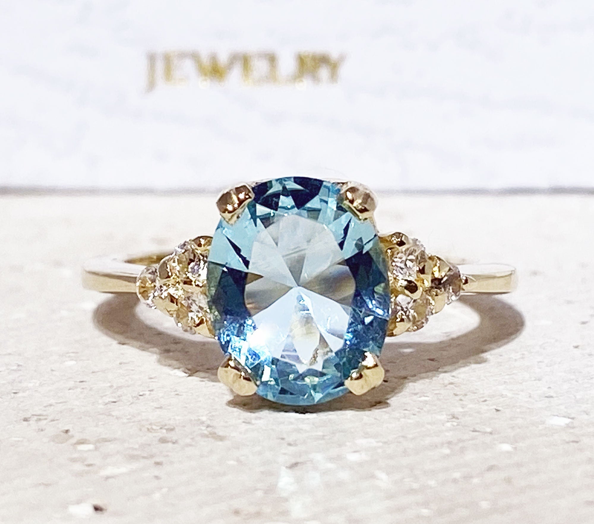 Blue Topaz Ring - December Birthstone - Oval Blue Topaz Statement Engagement Ring with Clear Quartz Accents - H.L.Jewelry