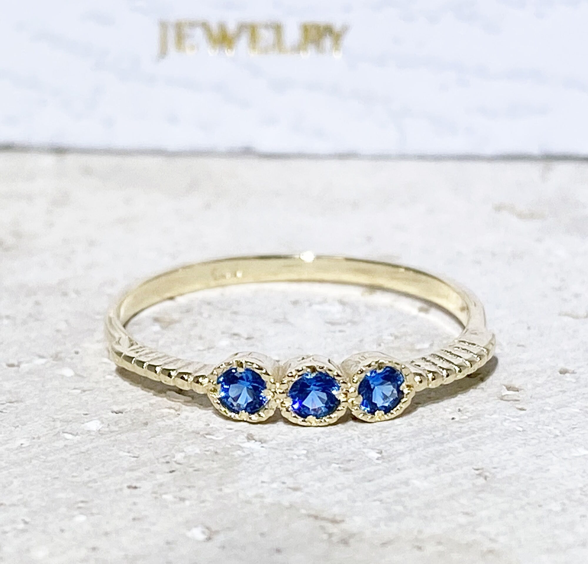 Blue Topaz Ring - December Birthstone - Tiny Stacking Ring with Three Round Blue Topaz Gemstones - H.L.Jewelry