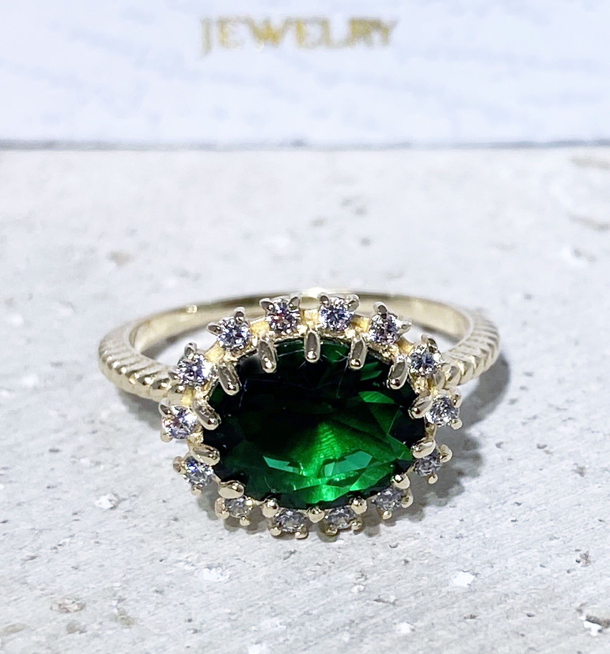 Emerald Ring - May Birthstone - Engagement Ring with Oval Emerald Gemstone and Clear Quartz Halo - H.L.Jewelry