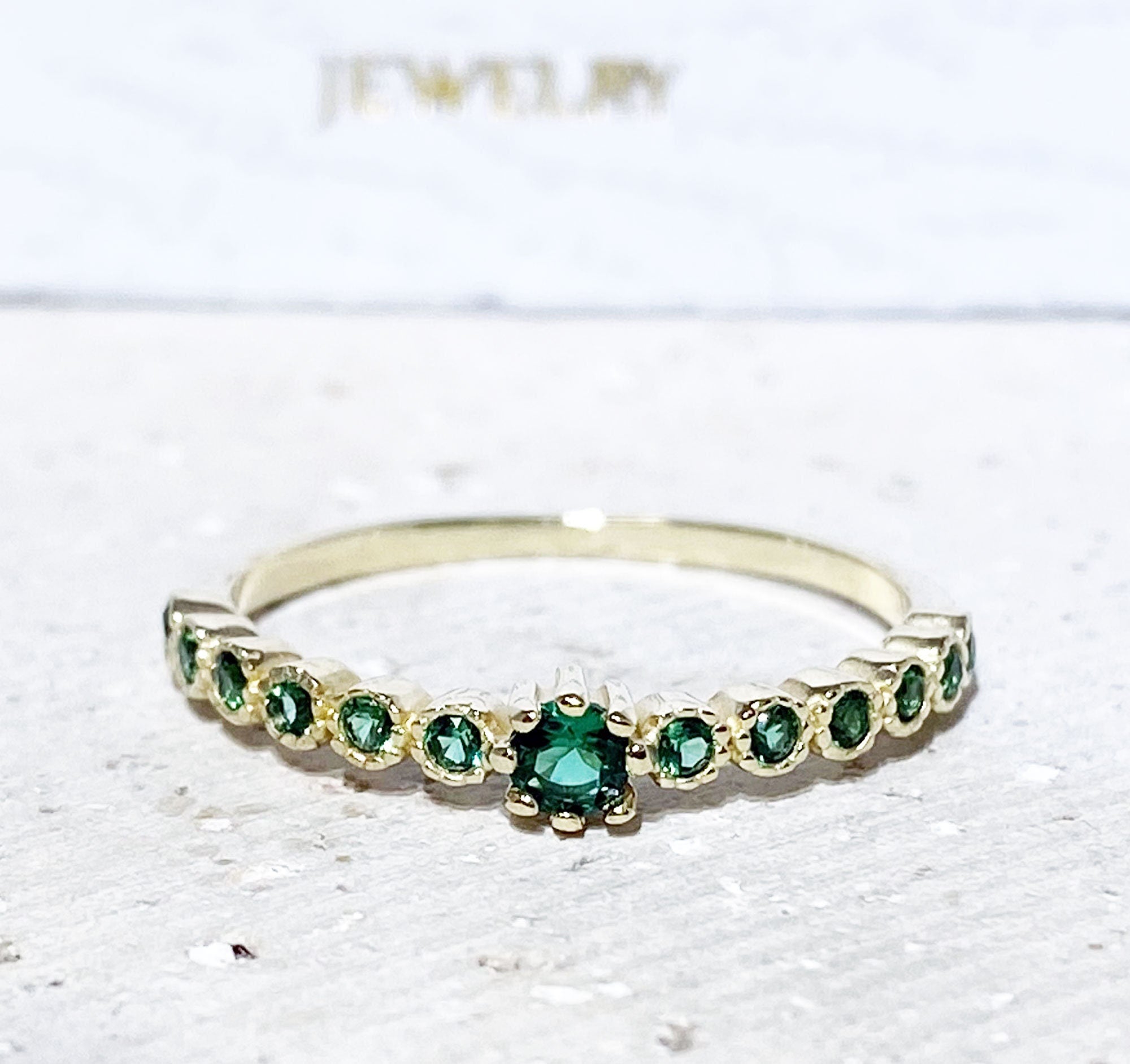 Emerald Ring - May Birthstone Jewelry - Delicate Stacking Half Eternity Ring with Thirteen Round Emerald Gemstones - H.L.Jewelry