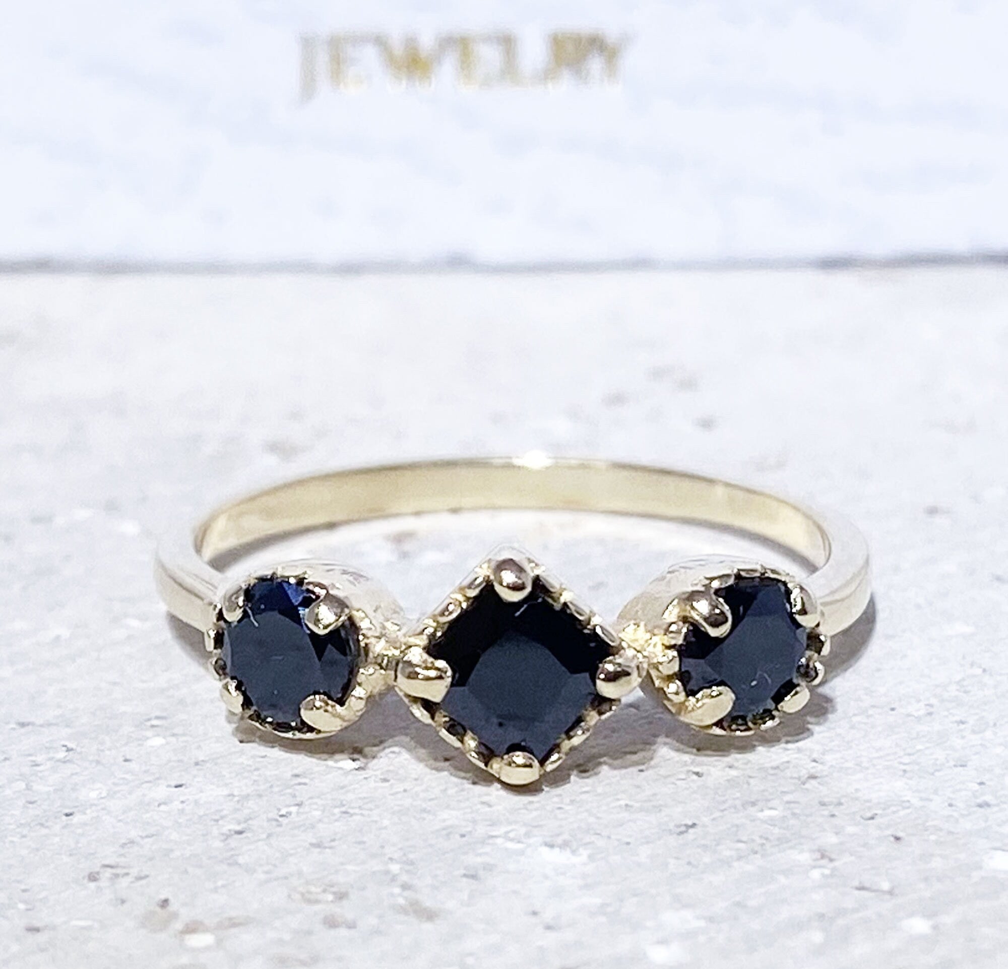 Black Onyx Ring - December Birthstone - Modern Sophistication: Ring with Square Black Onyx Center Stone and Side Accents - H.L.Jewelry