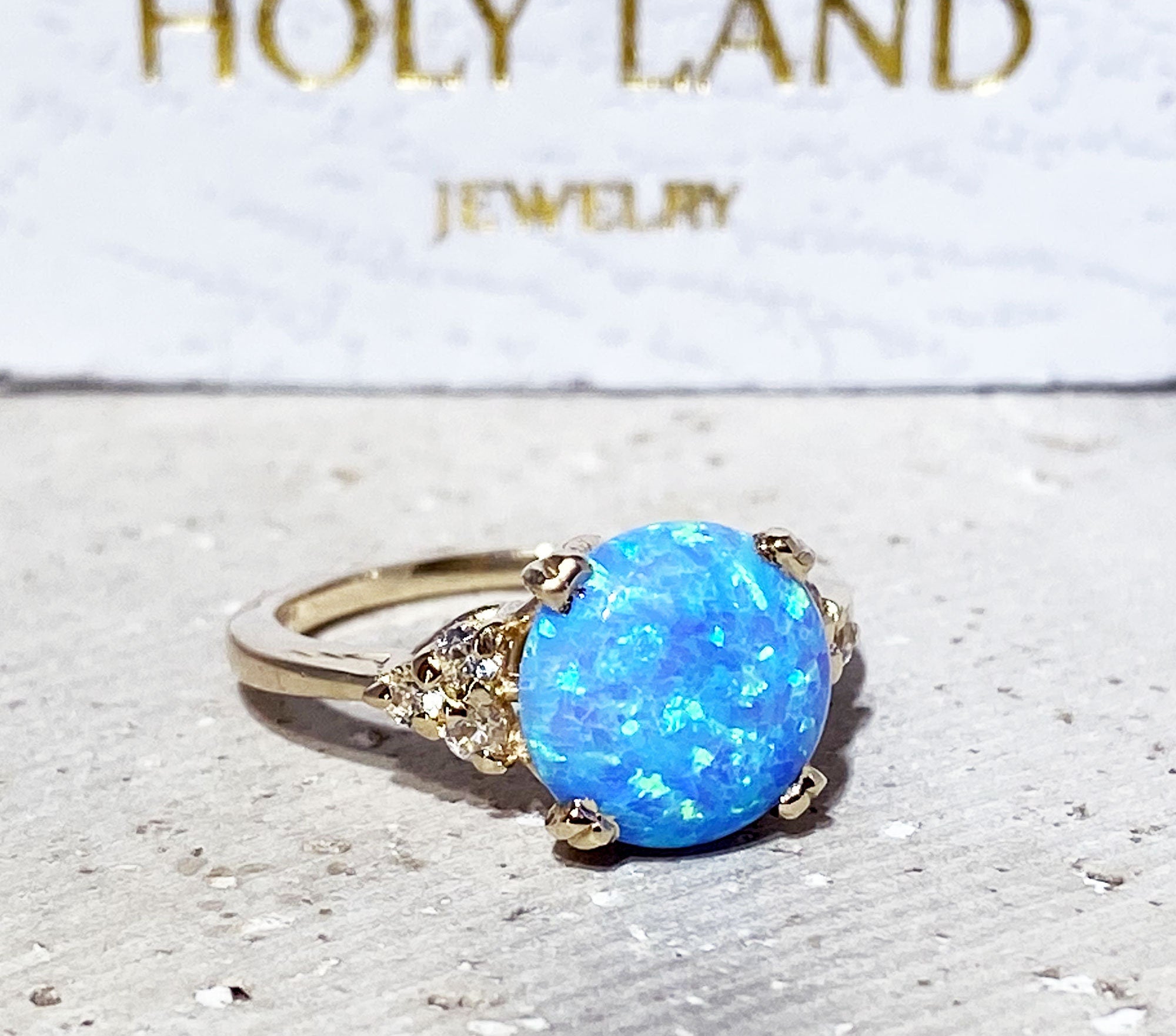 Blue Opal Ring - October Birthstone - Statement Engagement Ring with Round Blue Opal Middle Gemstone and Clear Quartz Accents - H.L.Jewelry