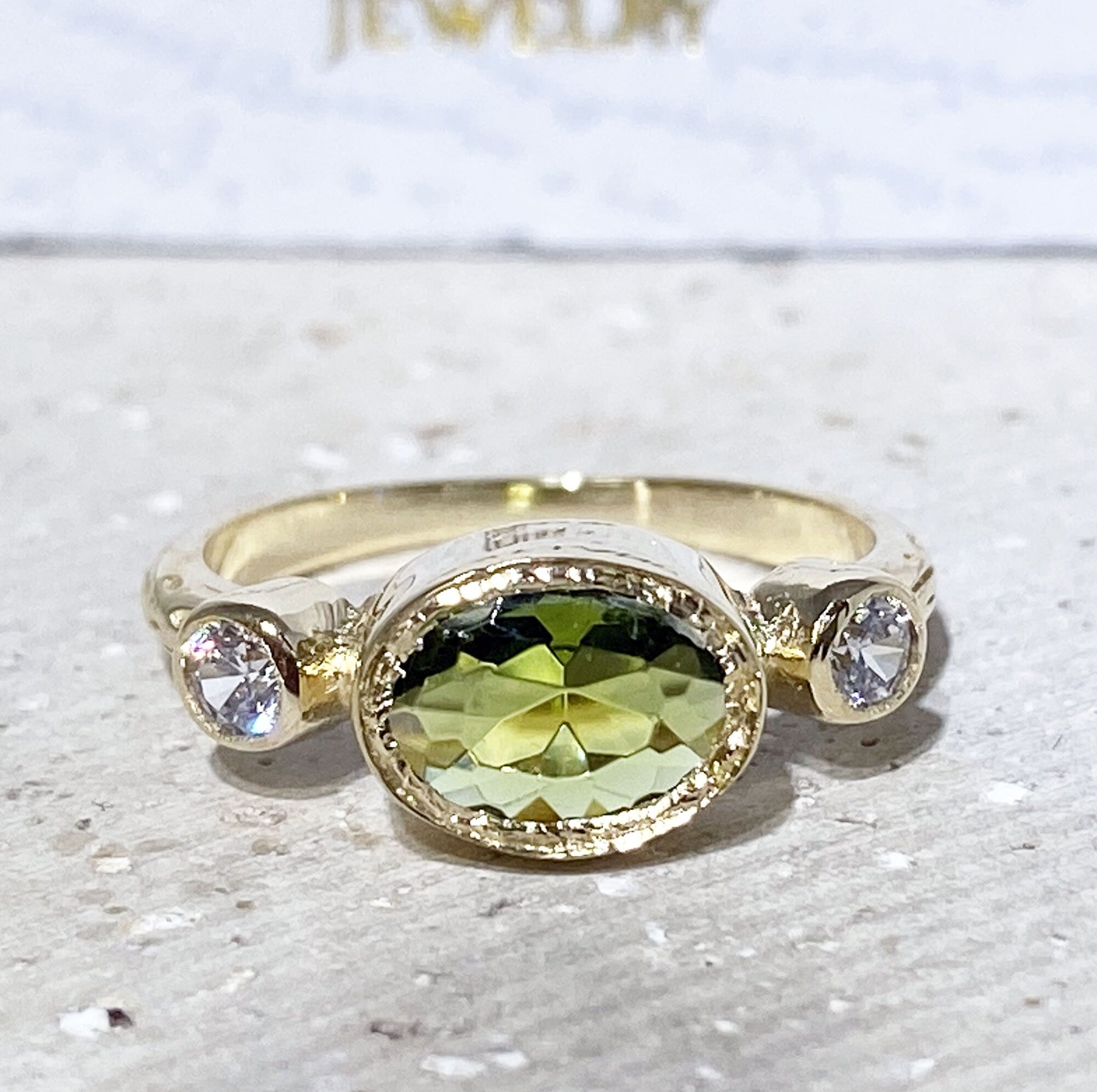 Peridot Ring - August Birthstone - Bezel Set Ring with Oval Peridot Gemstone and Clear Quartz Accents - H.L.Jewelry