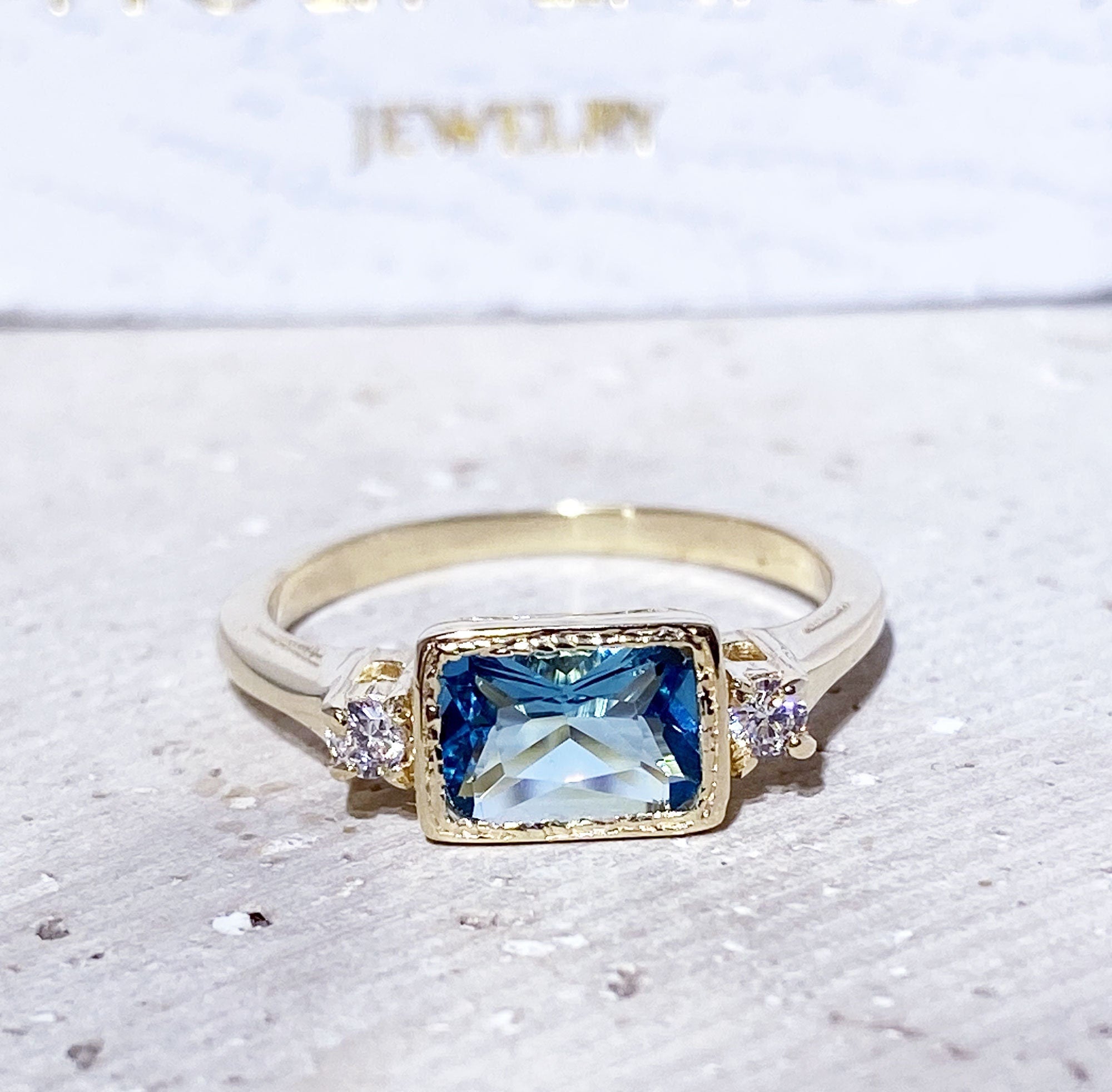 Blue Topaz Ring - December Birthstone - Simple Ring with Octagon Blue Topaz and Clear Quartz Accents - H.L.Jewelry