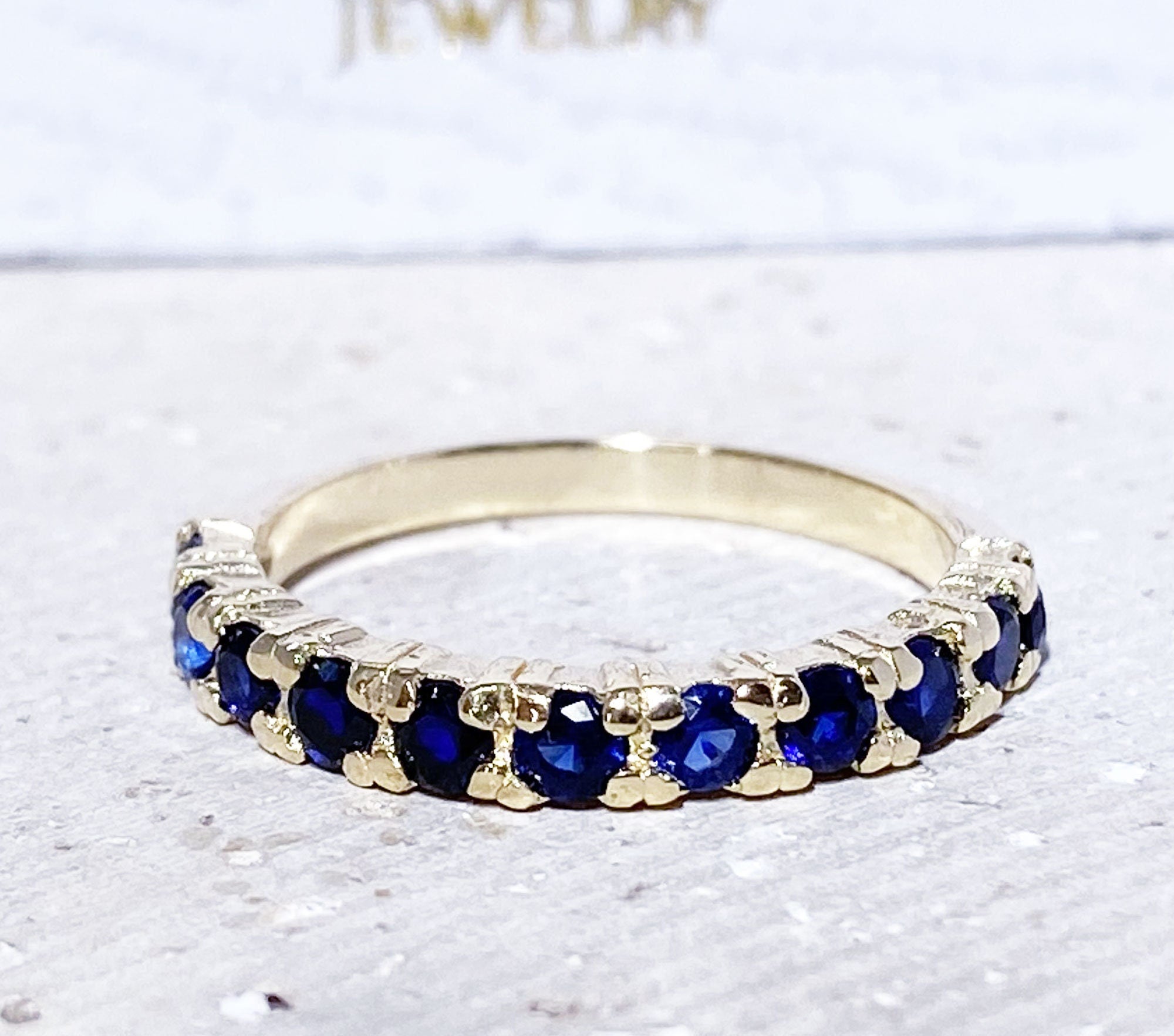 Blue Sapphire Ring - September Birthstone - Stacking Half Eternity Ring with Eleven Round Blue Sapphire Gemstones - H.L.Jewelry