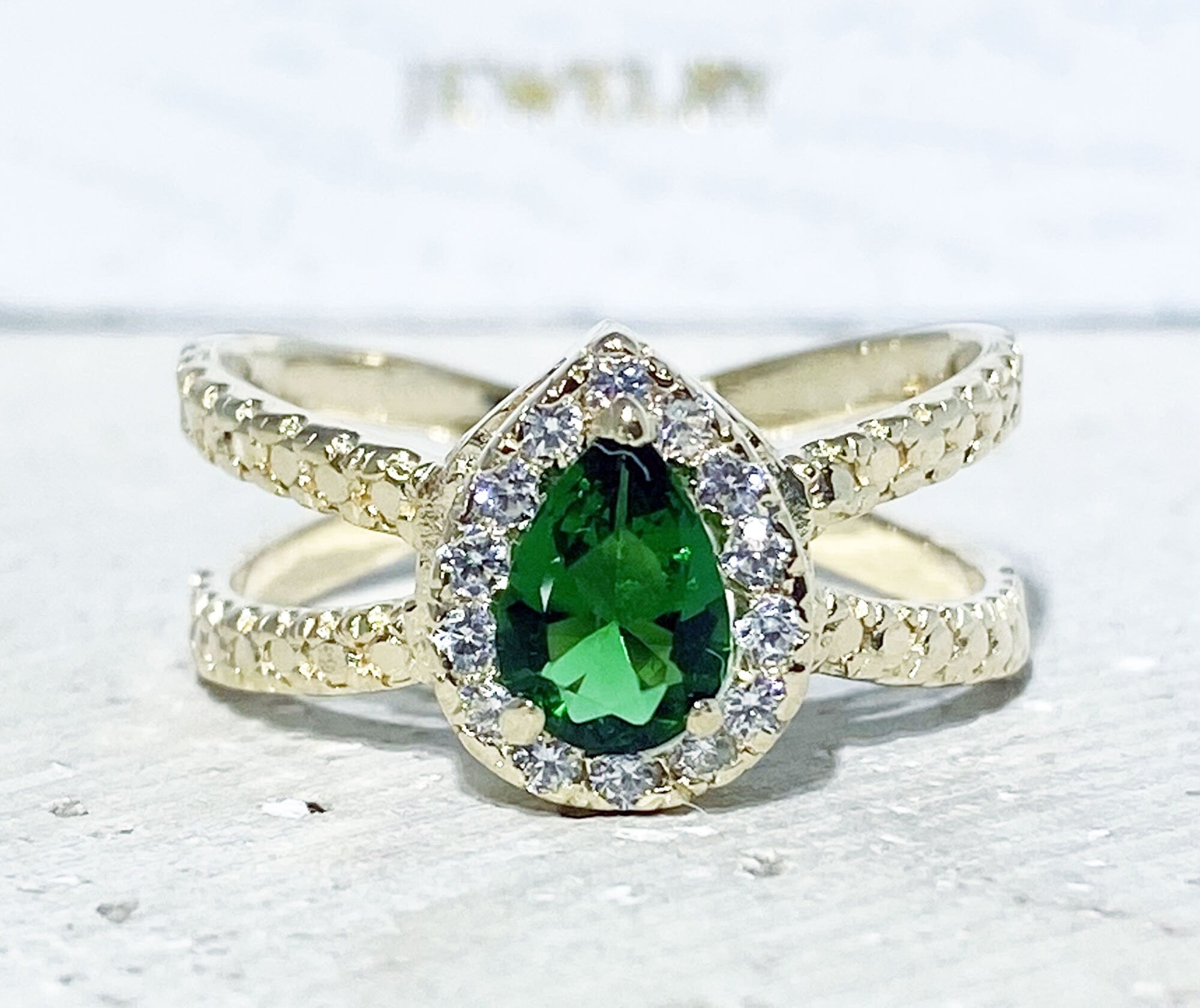 Emerald Ring - May Birthstone - Engagement Ring with Pear-Shaped Emerald Gemstone and Clear Quartz Halo - H.L.Jewelry