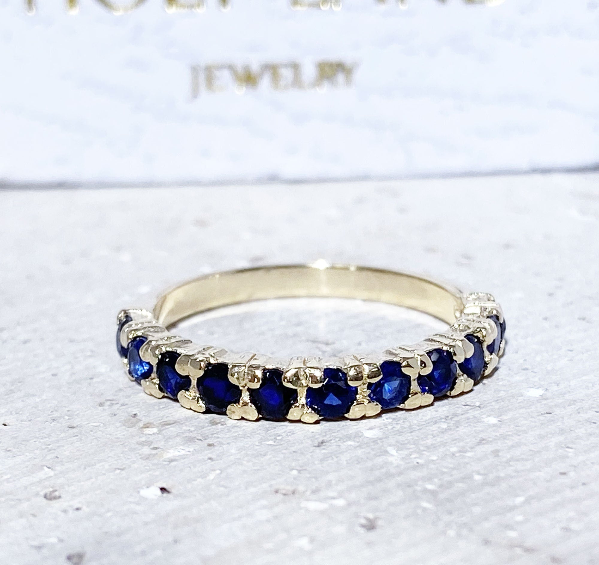 Blue Sapphire Ring - September Birthstone - Stacking Half Eternity Ring with Eleven Round Blue Sapphire Gemstones - H.L.Jewelry