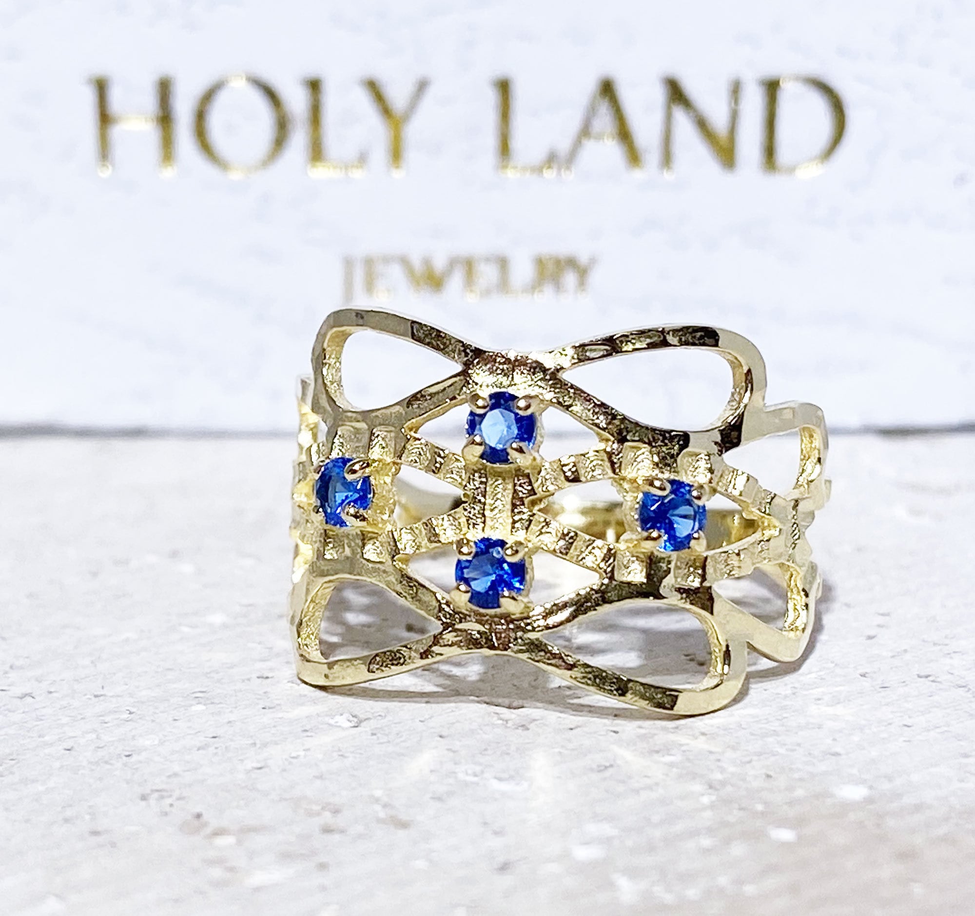 Blue Topaz Ring - December Birthstone - Hammered Ring with Four Round Blue Topaz Gemstones - H.L.Jewelry