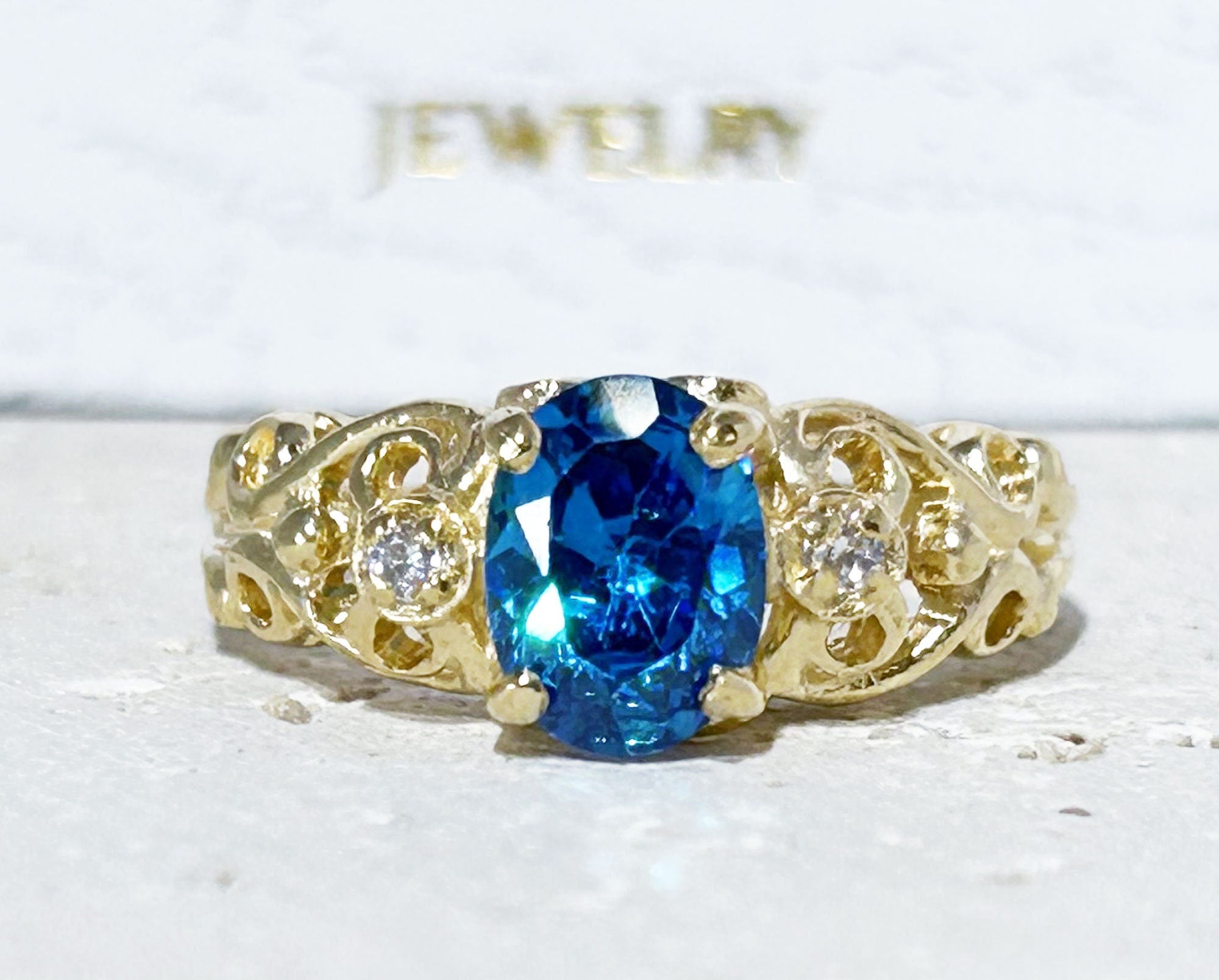 Blue Topaz Ring - December Birthstone - Lace Ring with Oval Blue Topaz Gemstone and Clear Quartz Accents - H.L.Jewelry