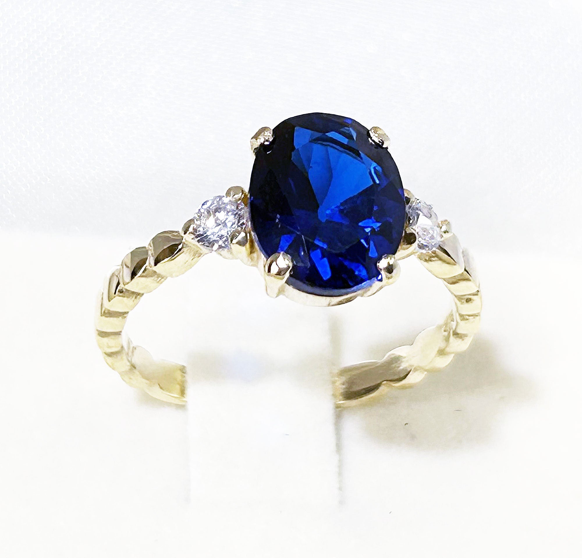 Blue Sapphire Ring - September Birthstone - Oval Blue Sapphire Gemstone Ring with Clear Quartz Accents - H.L.Jewelry