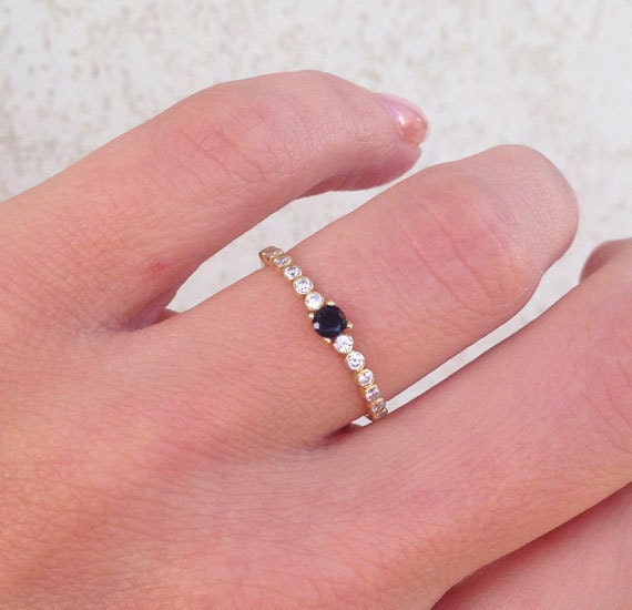 Timeless Contrast: Delicate Stacking Ring with Black Onyx Center Gemstone and Clear Quartz Accents - H.L.Jewelry