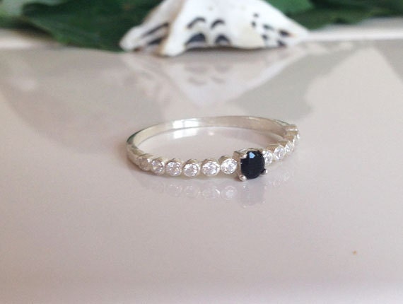 Timeless Contrast: Delicate Stacking Ring with Black Onyx Center Gemstone and Clear Quartz Accents - H.L.Jewelry