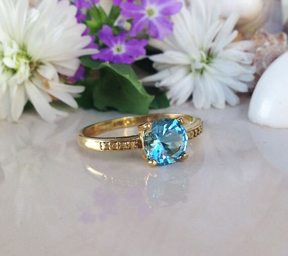 Blue Topaz Ring - December Birthstone - Round Blue Topaz Gemstone Simple Ring with Imitation Stones - H.L.Jewelry