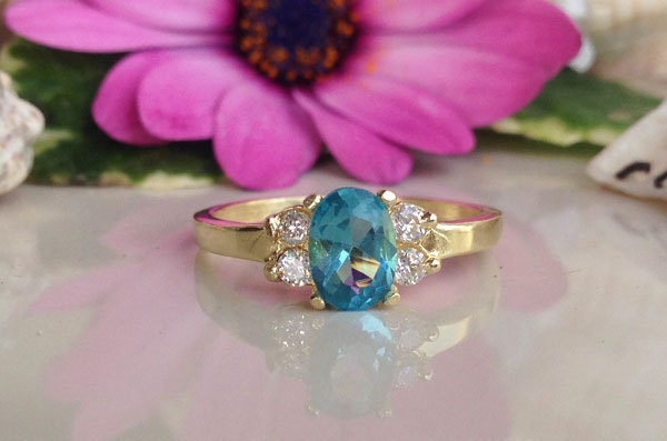 Blue Topaz Ring - December Birthstone - Tiny Delicate Ring with Oval Blue Topaz Gemstone and Clear Quartz Accents - H.L.Jewelry