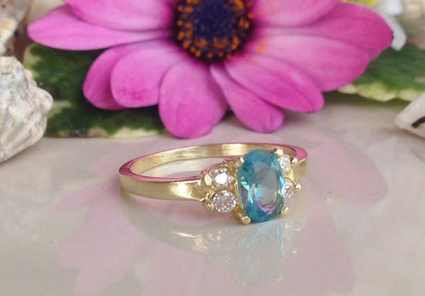 Blue Topaz Ring - December Birthstone - Tiny Delicate Ring with Oval Blue Topaz Gemstone and Clear Quartz Accents - H.L.Jewelry